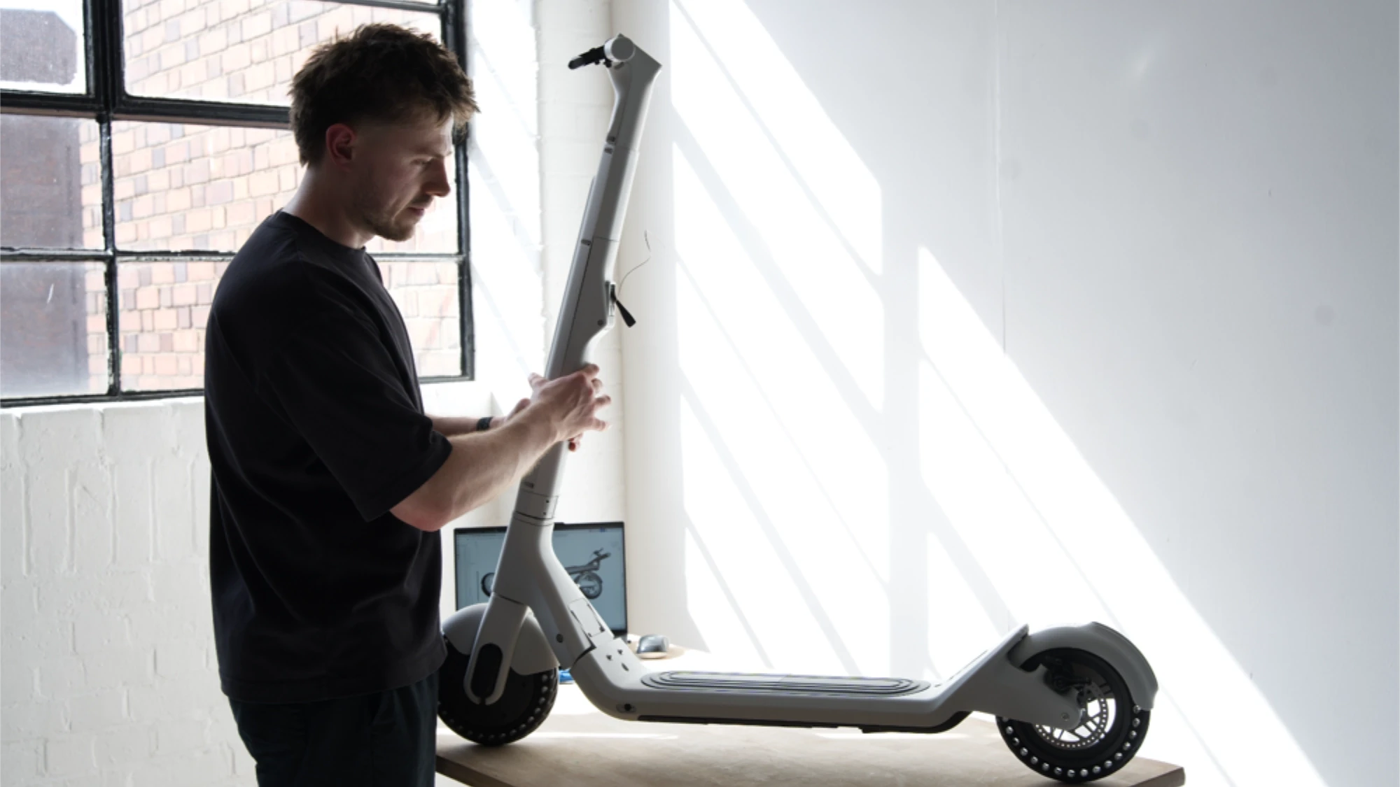3D-printed prototype of an electric scooter frame developed to evaluate form, component integration, and overall design feasibility.