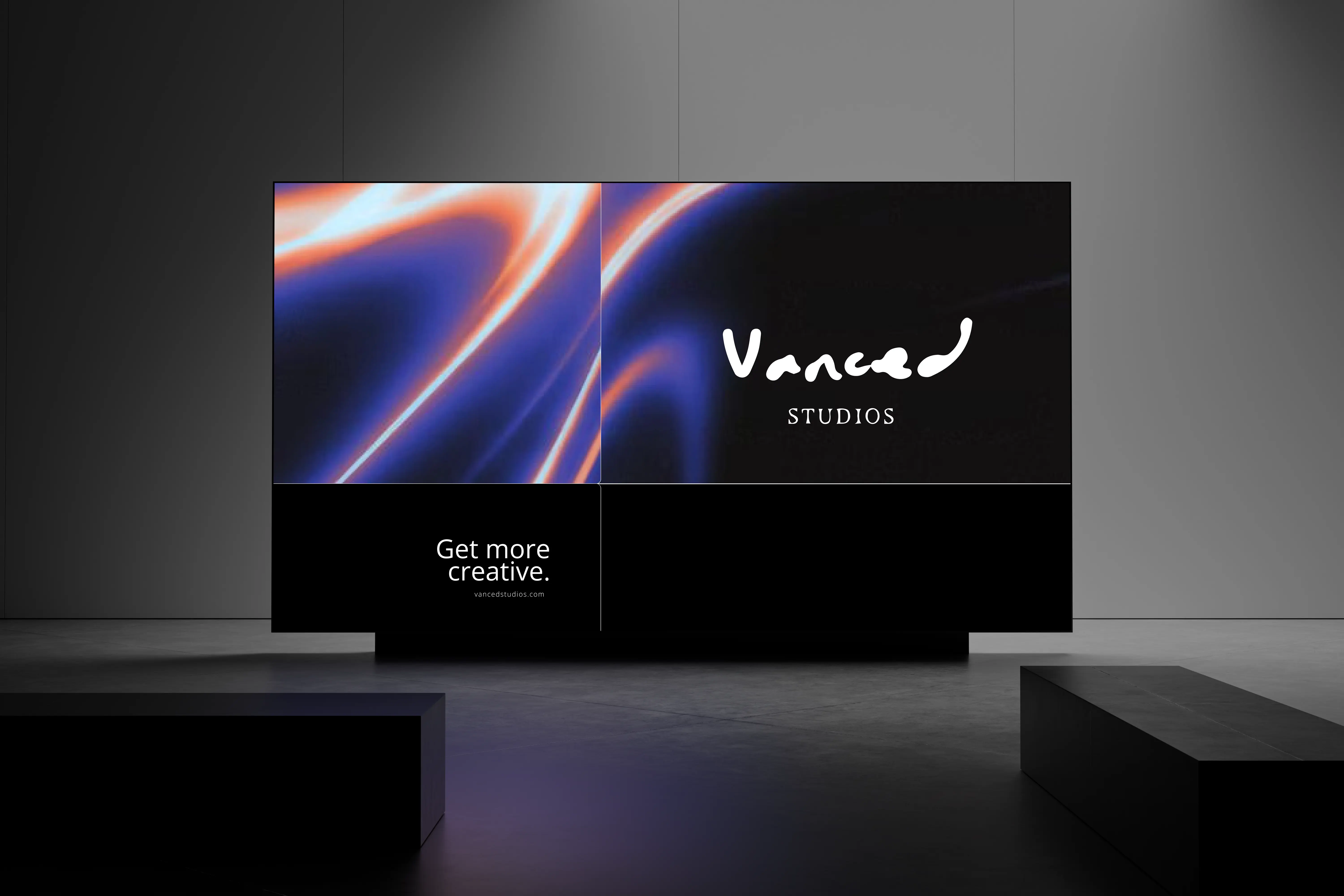 A modern bedroom with a tufted headboard and art.