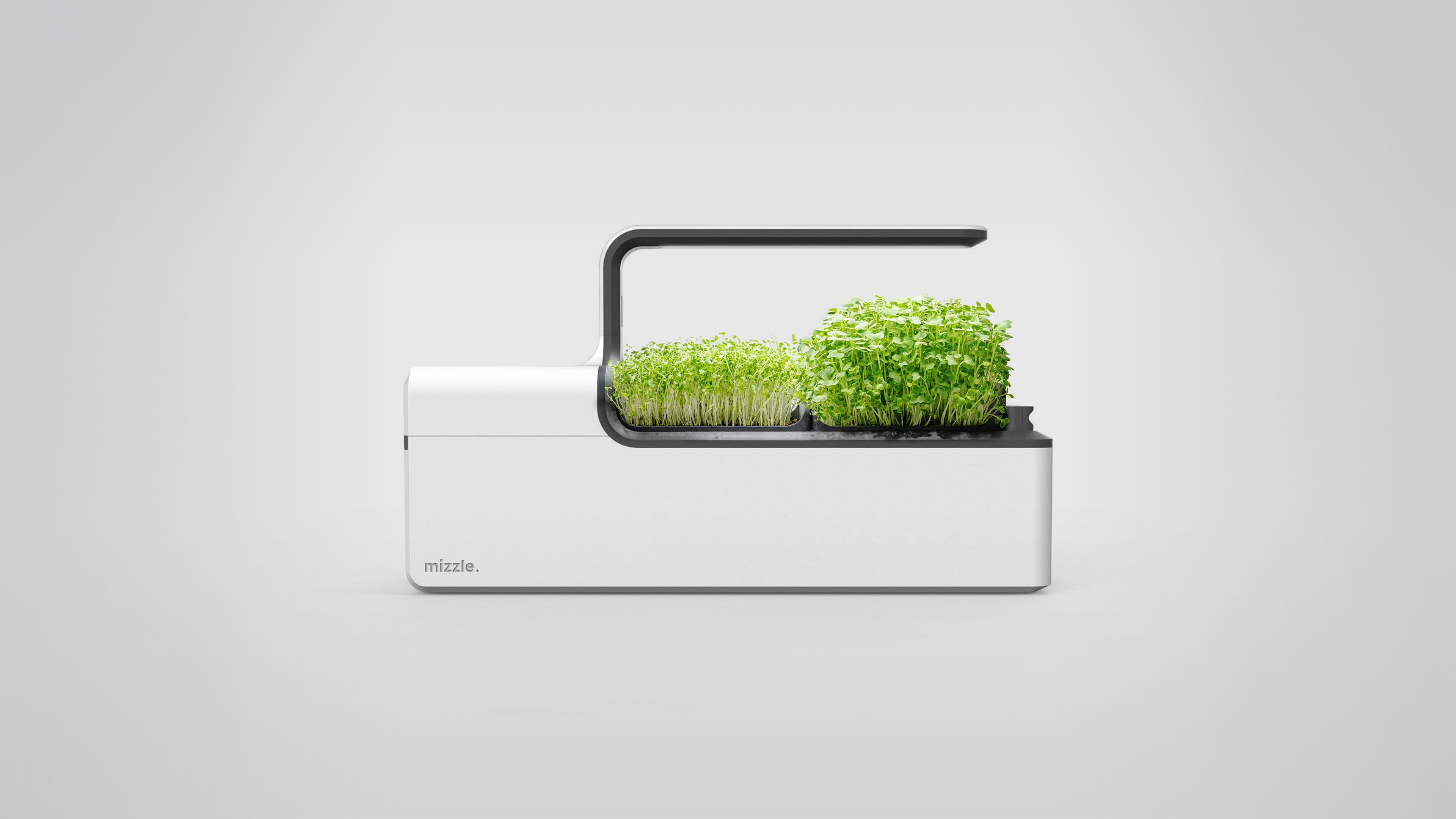 Batch.Works logo over a photo of a box of 3D printed objects