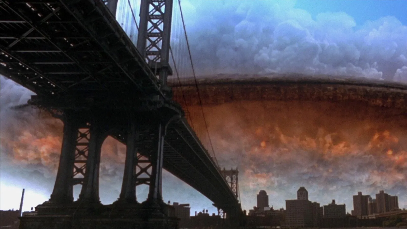 A massive, ominous spaceship hovers over a cityscape dominated by the silhouette of a large suspension bridge, with thick clouds and a fiery sky suggesting an impending alien invasion.