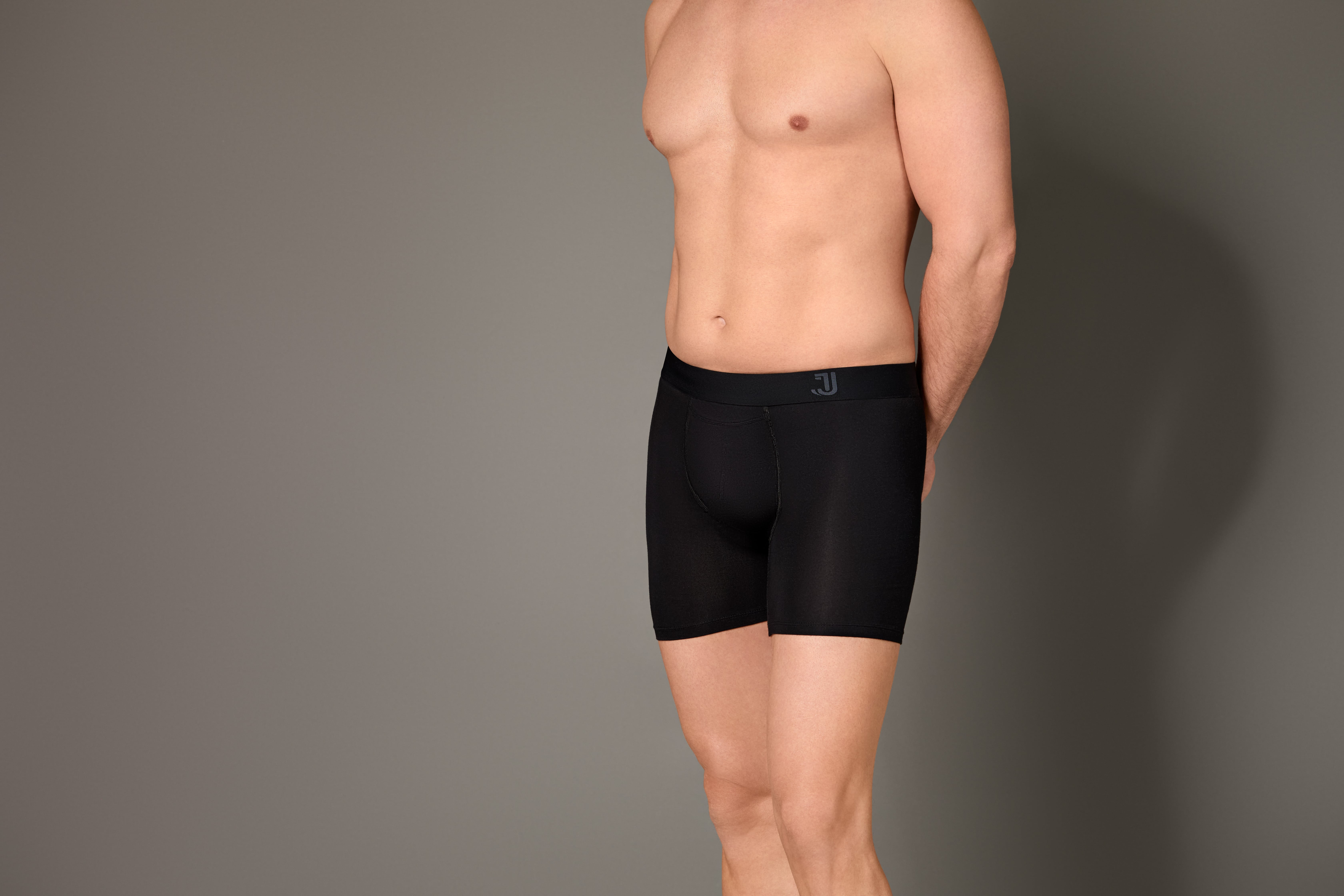 A man works on a laptop