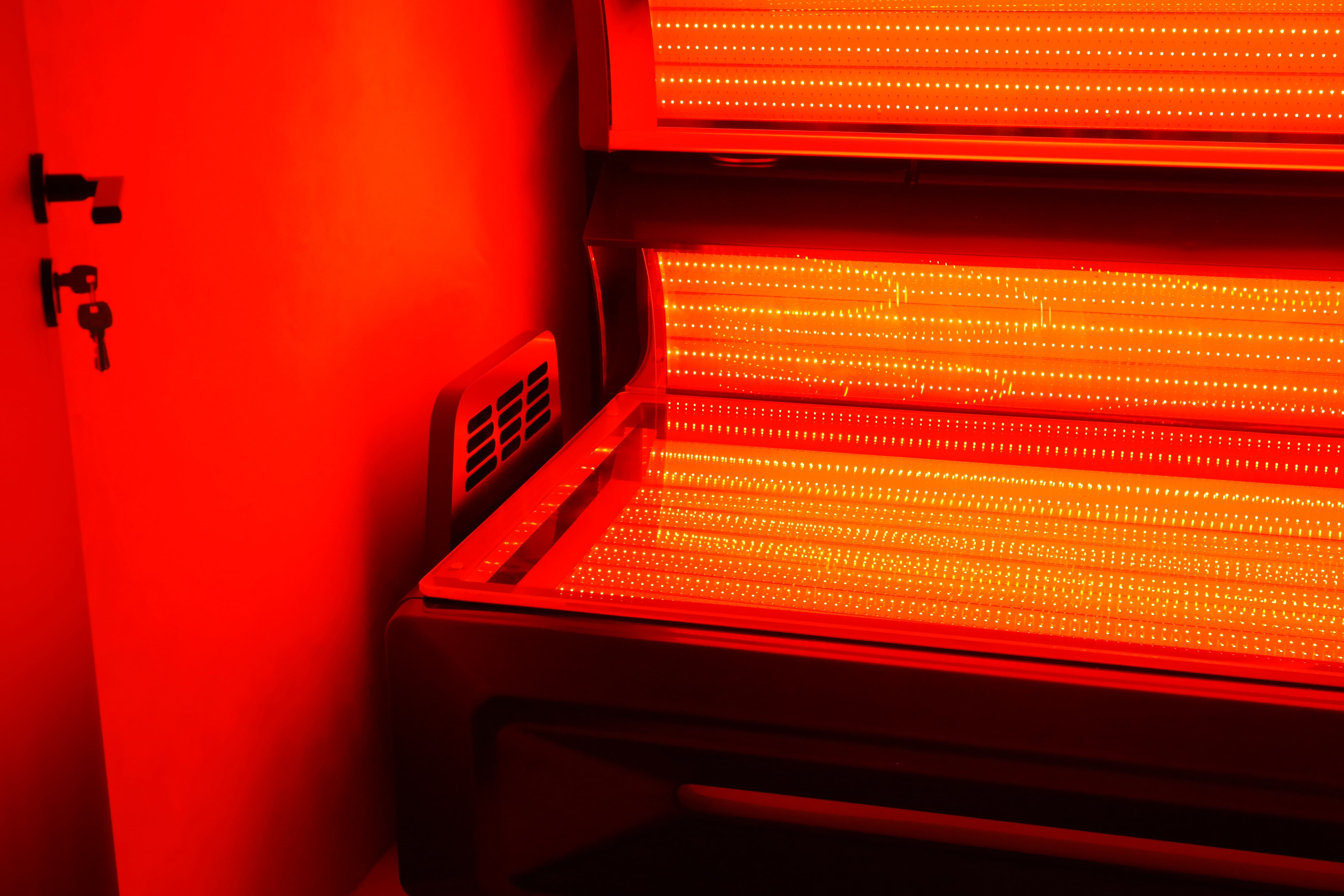 Woman doing red light therapy (RLT)