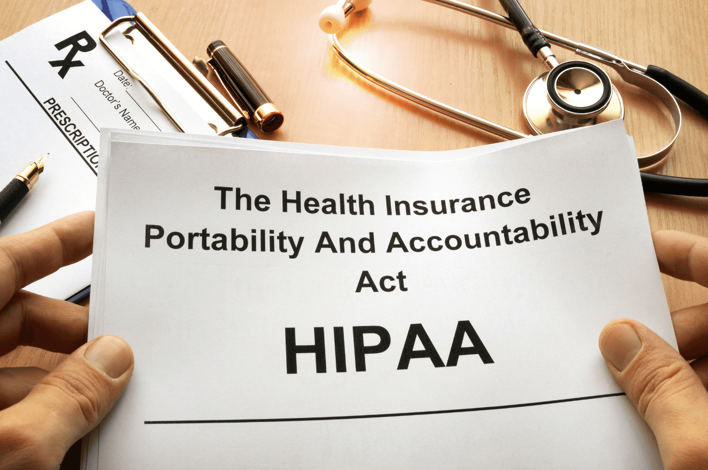 man holding hipaa papers