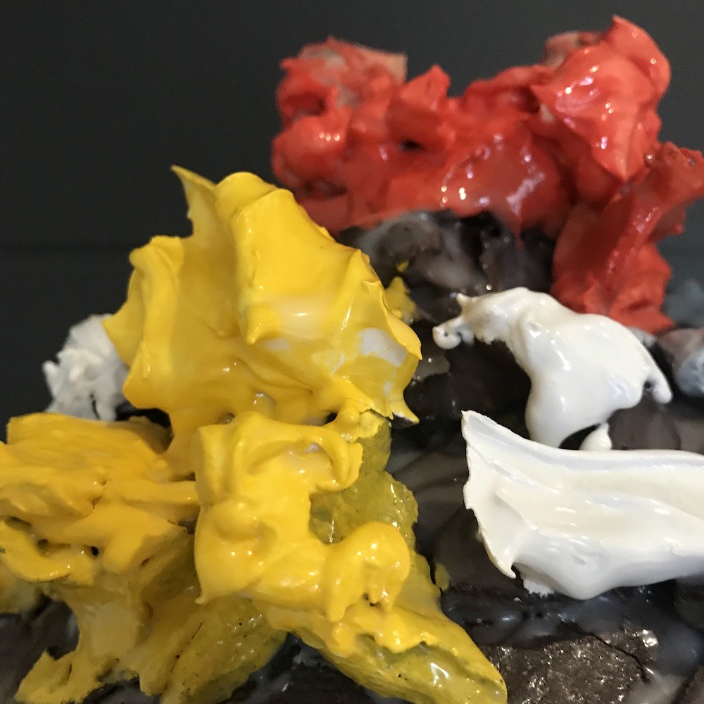 Shirtless man meditating indoors