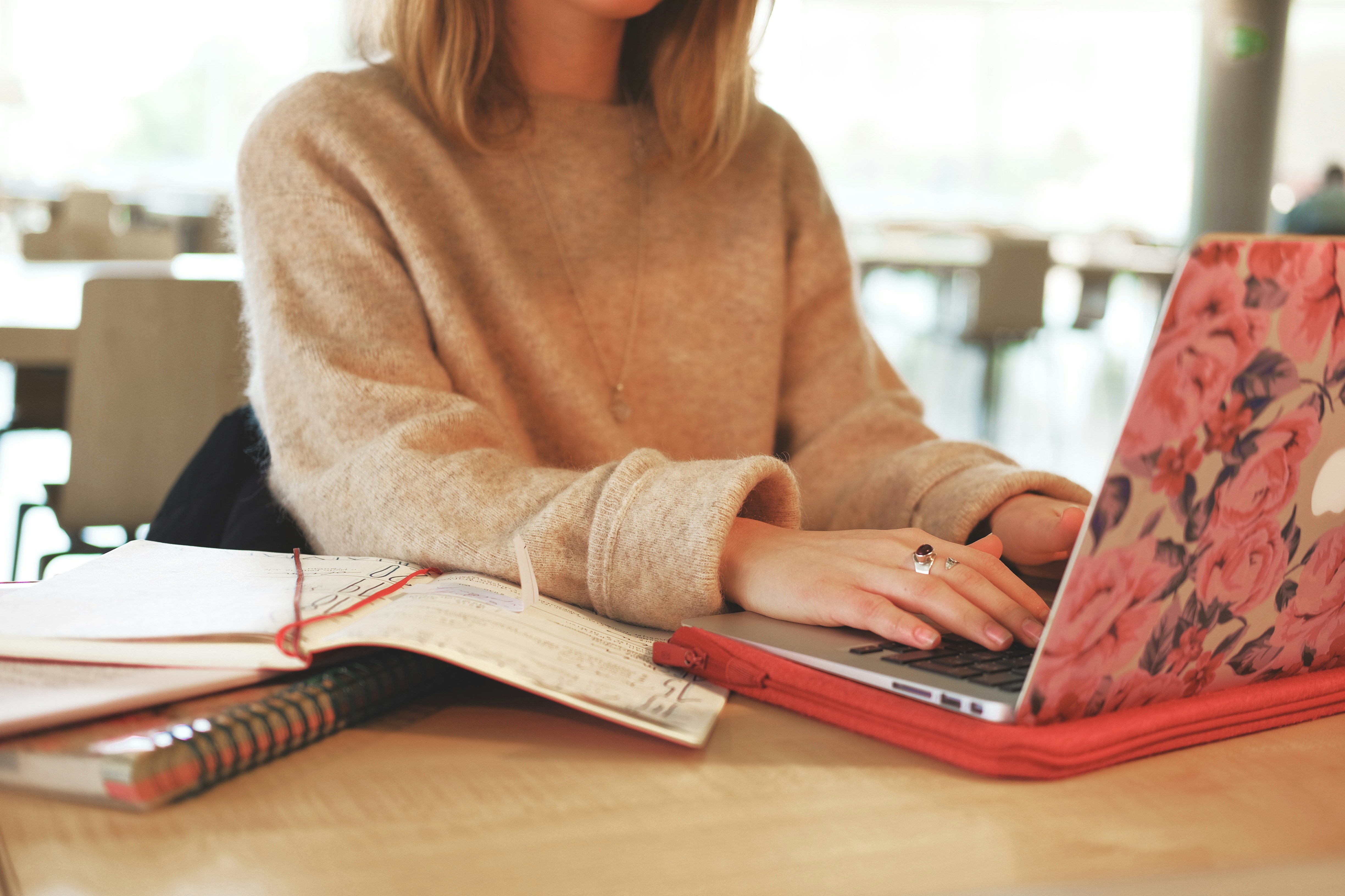 woman working on laptop - Essay Extender