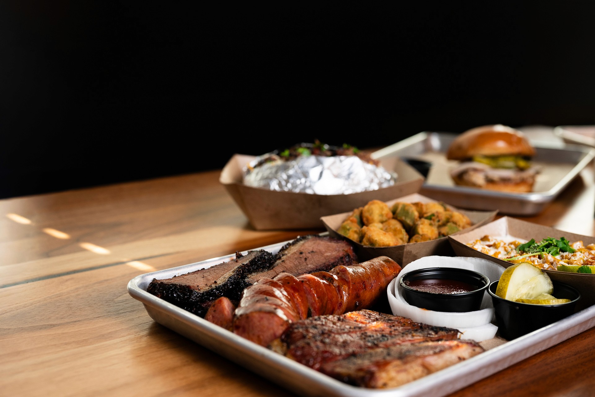 bbq food photography of a tray of meat platter with sides
