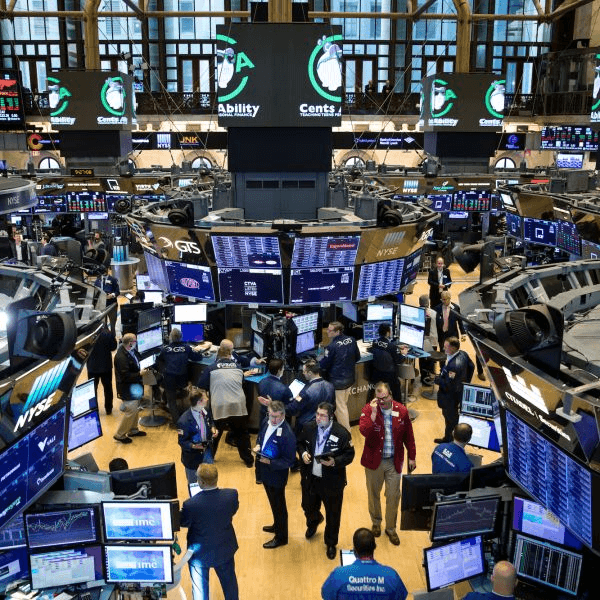 Woman standing in an architect studio with building models