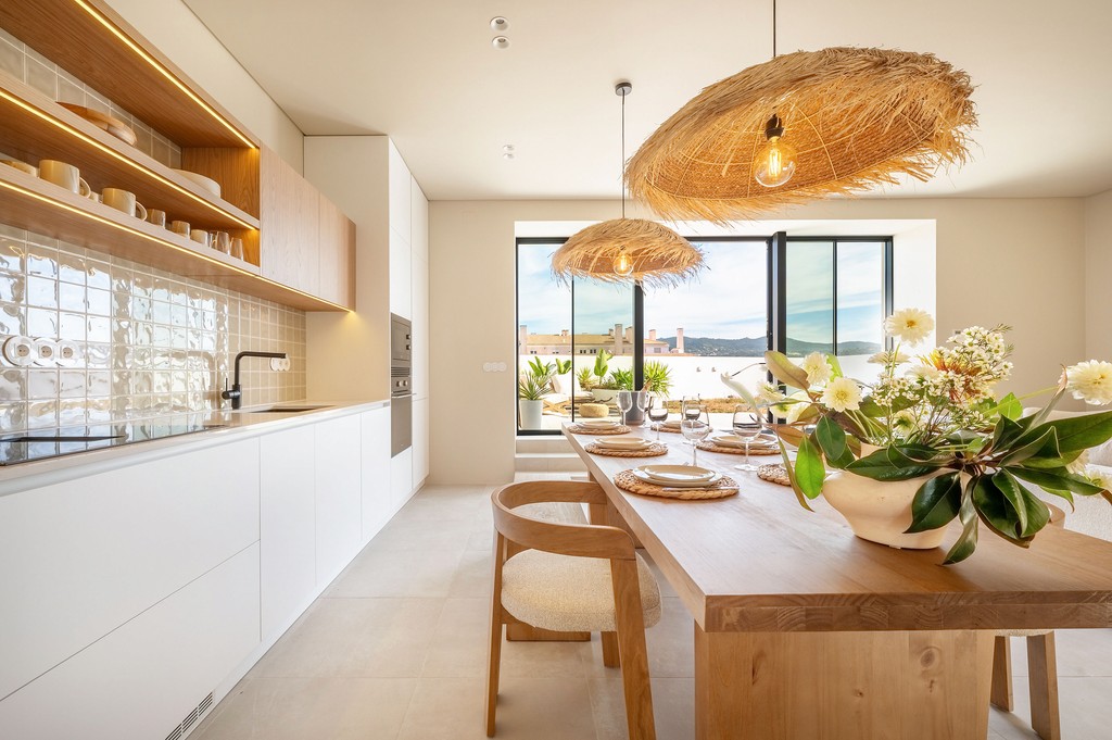Open kitchen and dining area with morning light