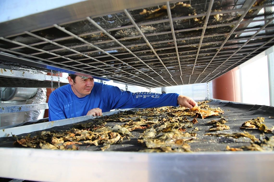 a black and white living room with a large tv