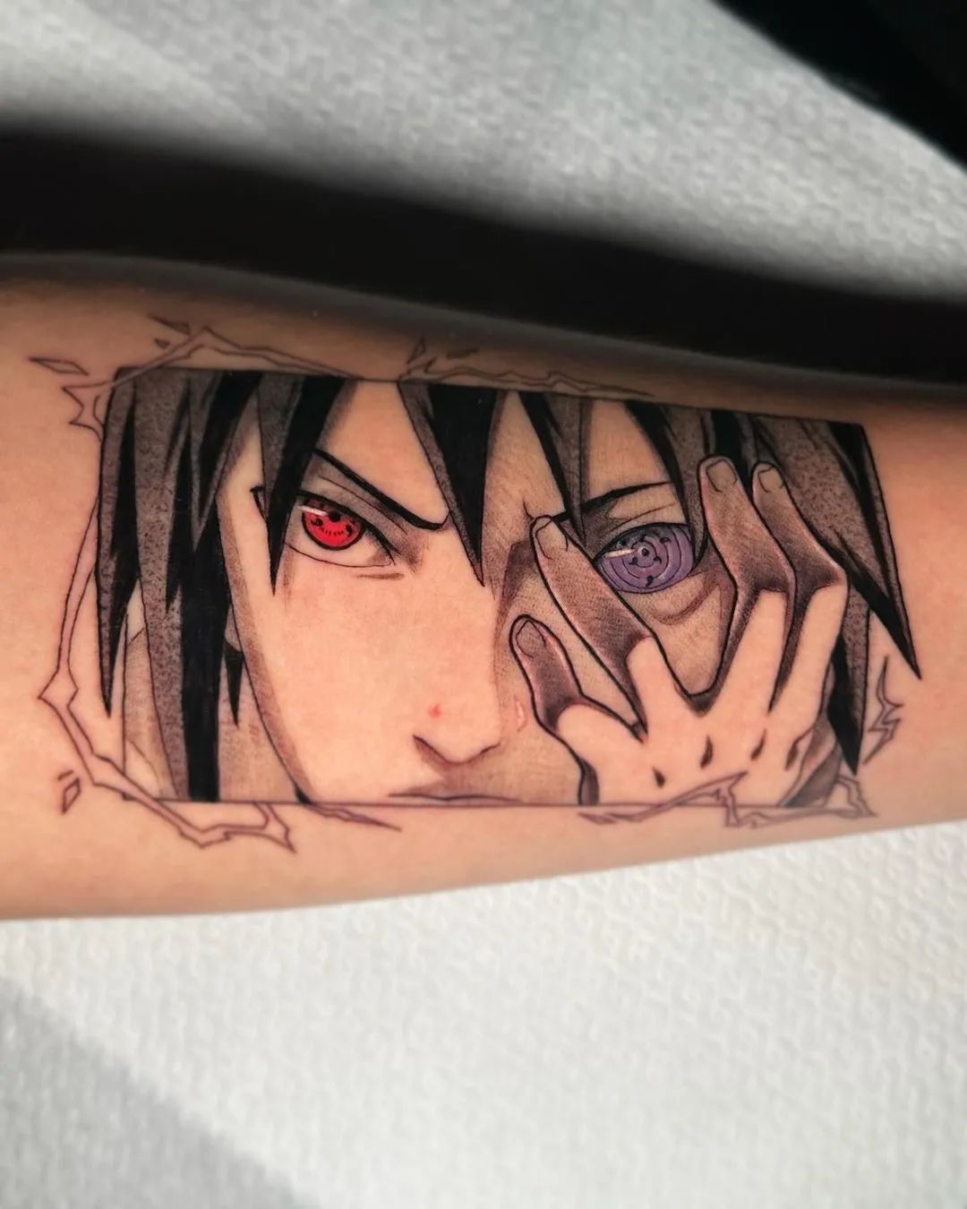 sasuke eyes tattoo