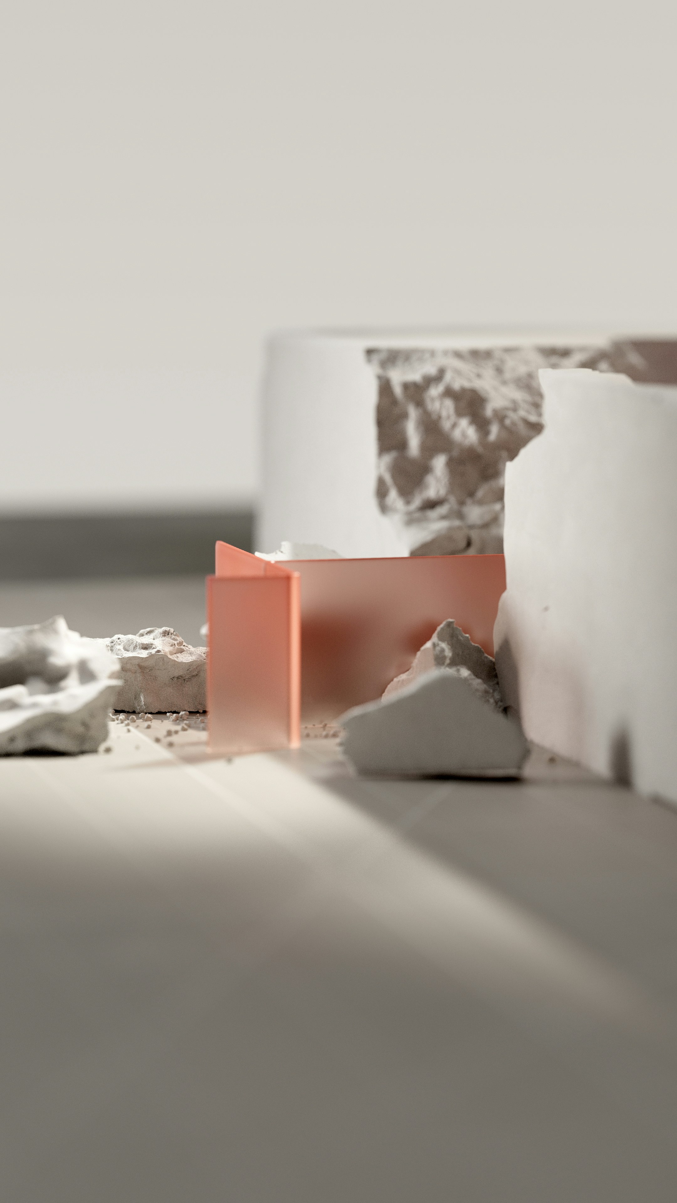 a close up of a white vase on a table