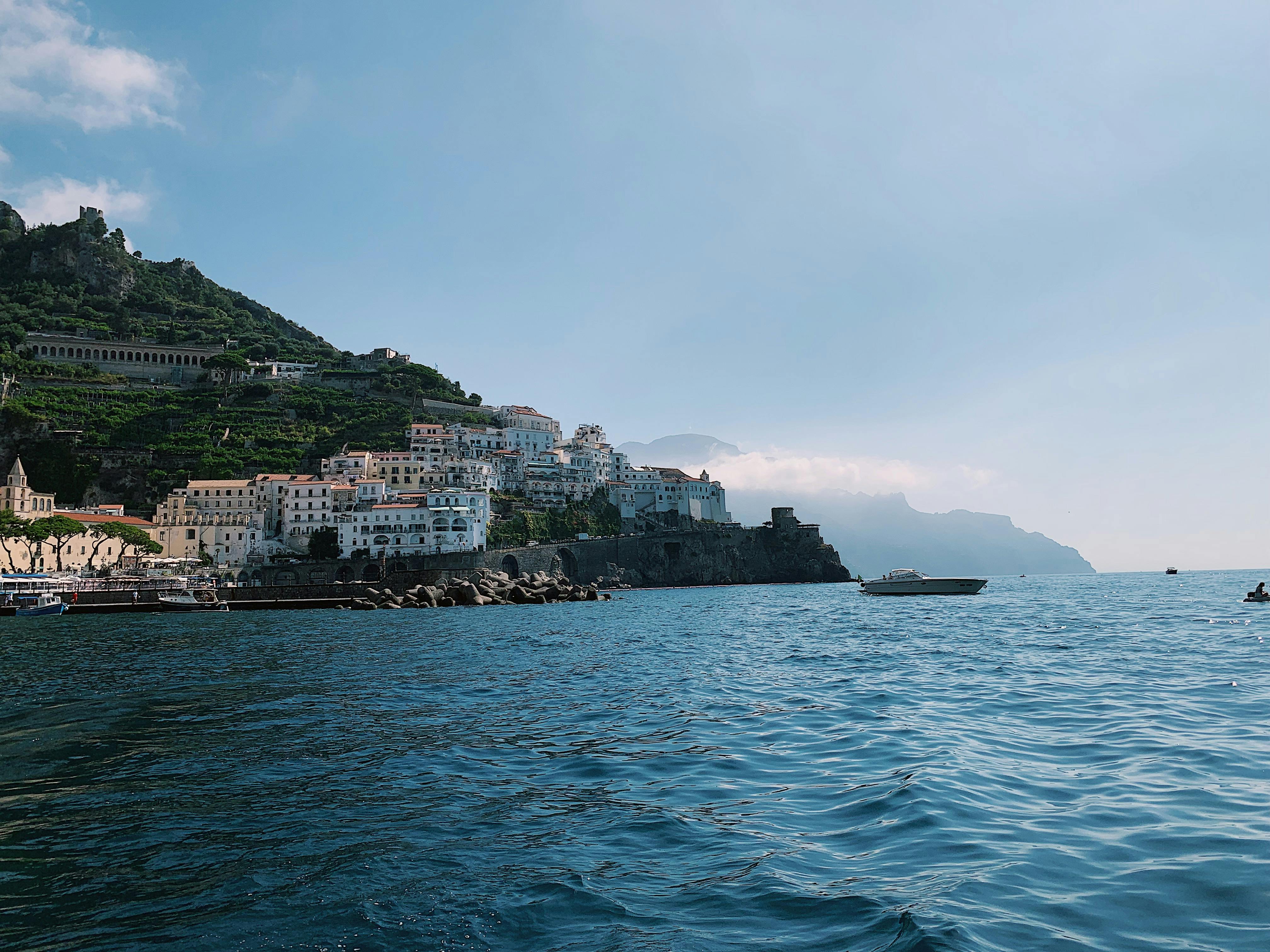 an aerial view of a desert with rocks and sand