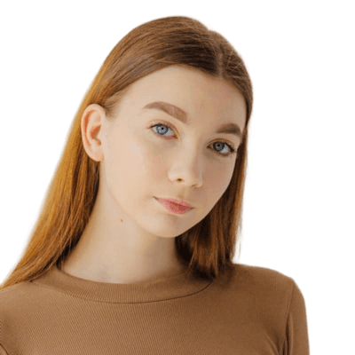 A young woman with long auburn hair and blue eyes, wearing a brown shirt looking at the viewer.