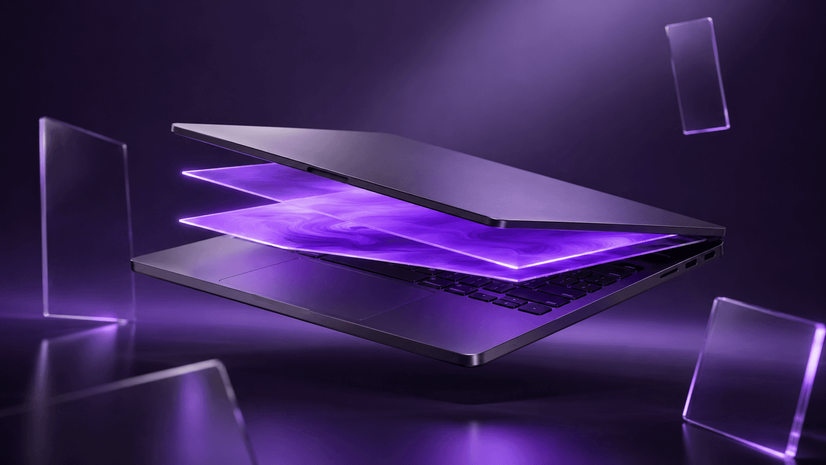 Layered glowing display rising from a laptop, illustrating running Windows on a Mac
