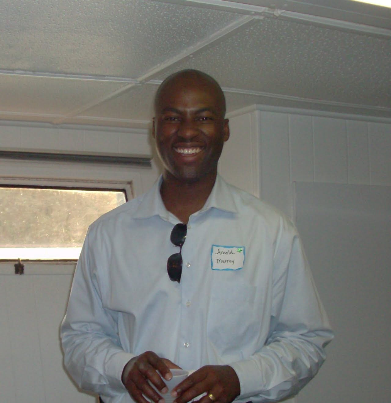 person sitting in a chair in front of a man