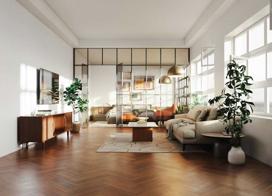 Bright living room with a glass partition to the next room