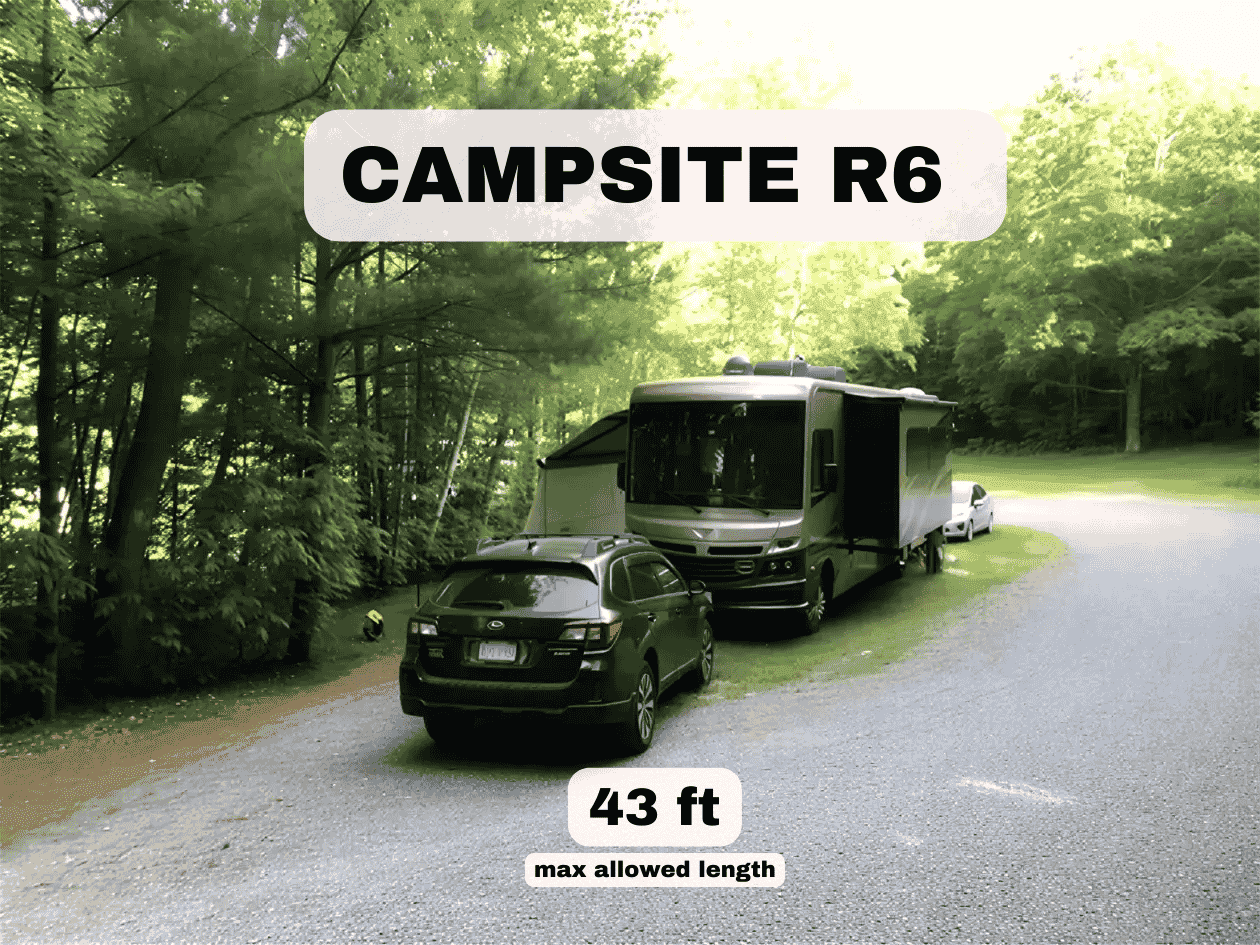 Wooded RV site R6 with large motorhome. Text: Campsite R6, 43 ft max allowed length.