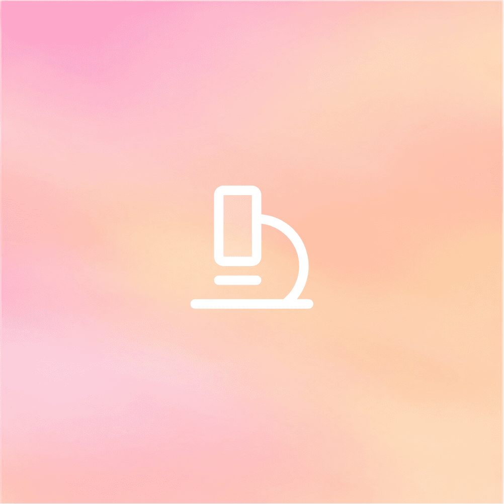 Macro of clear effervescent bubbles in water on a soft gray background—sparkling, minimal texture for clean skincare aesthetic.