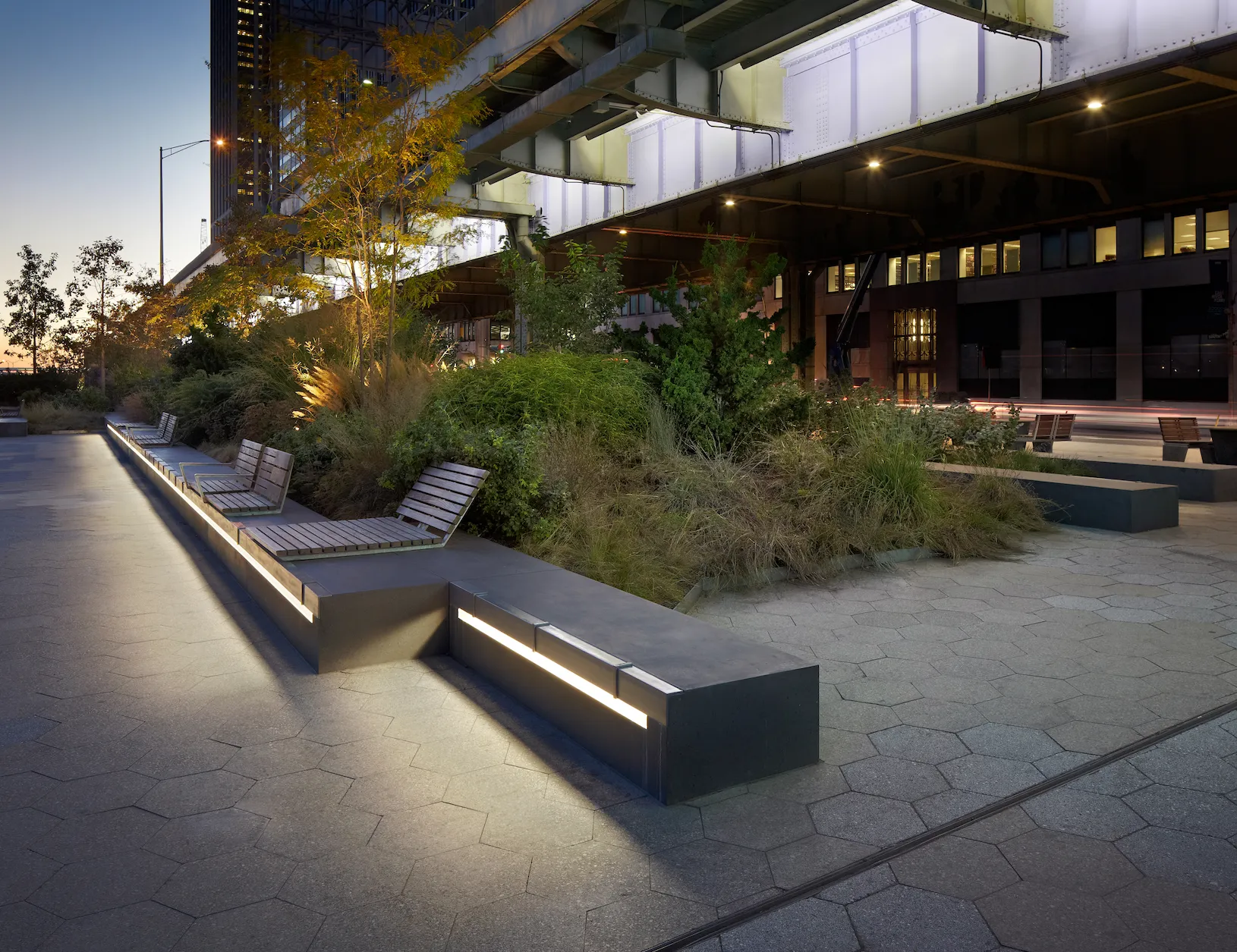 Museum campus and connecting park bridge showing facade illlumination and pedestrian lighting