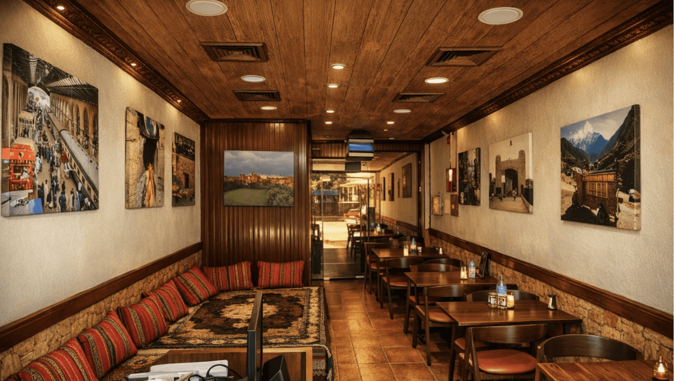 an interior of a fine dining restaurant with focused shot on the table with the plates and glass has been served