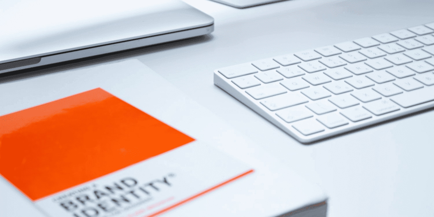 Notepad and keyboard on modern office desk for recruiters showing workspace tools