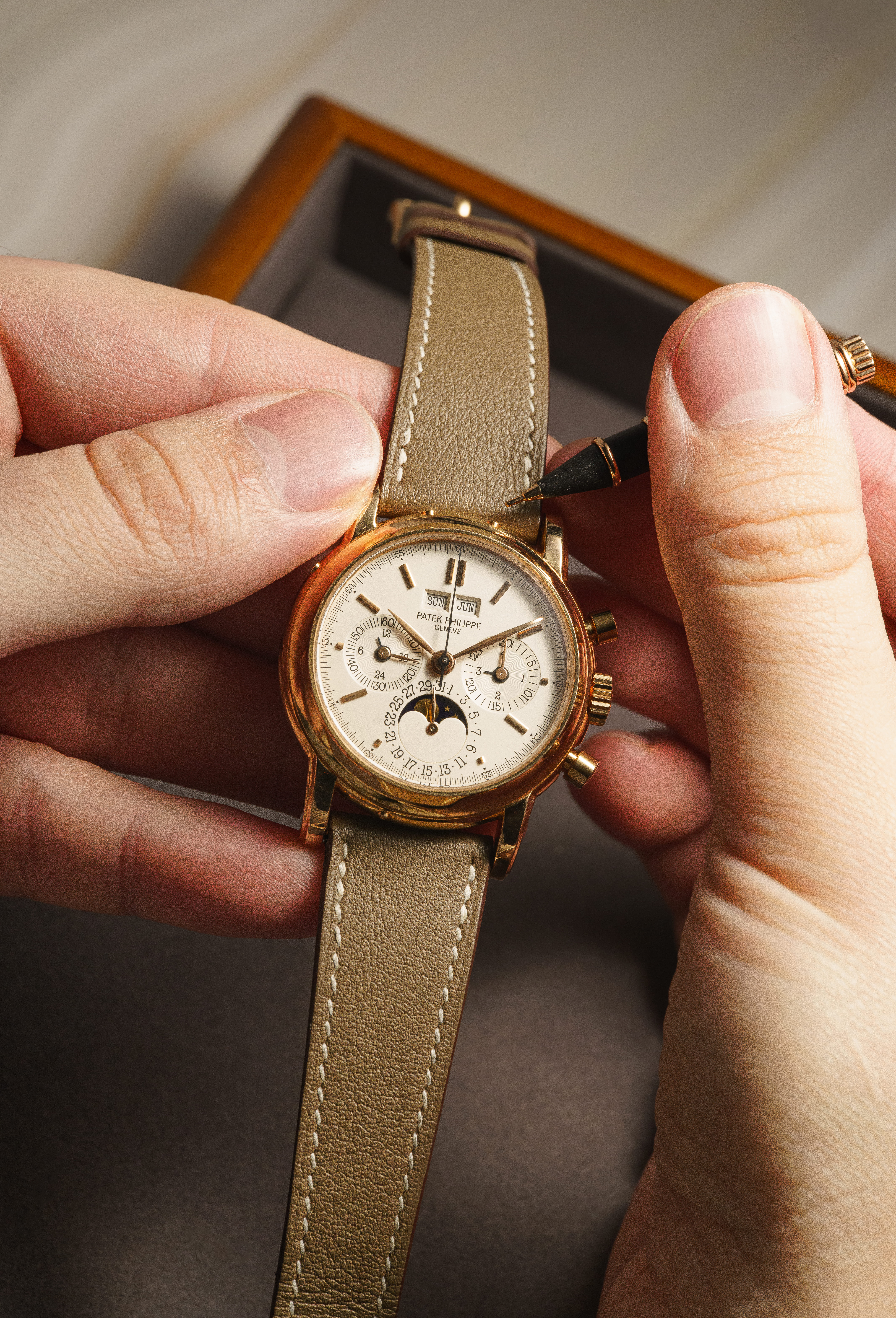 kids lying on a glass land and smiling