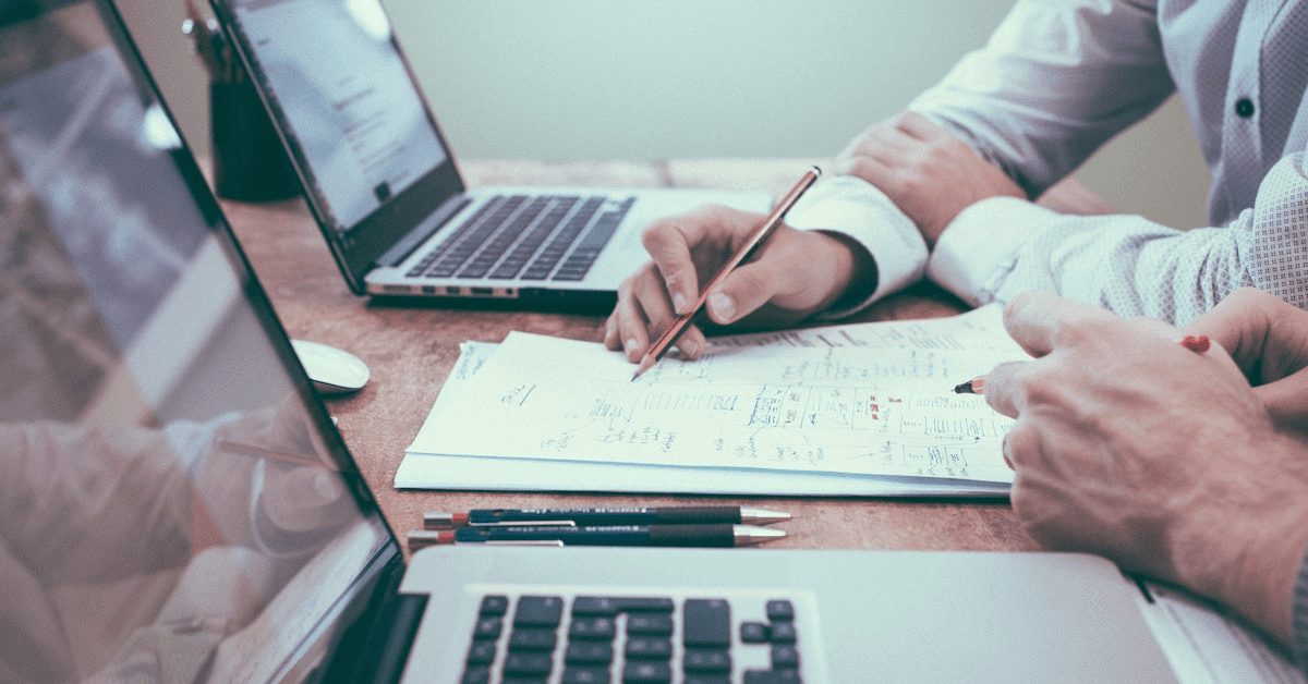 High school student writing about research experience in the Common App Activities section on a laptop