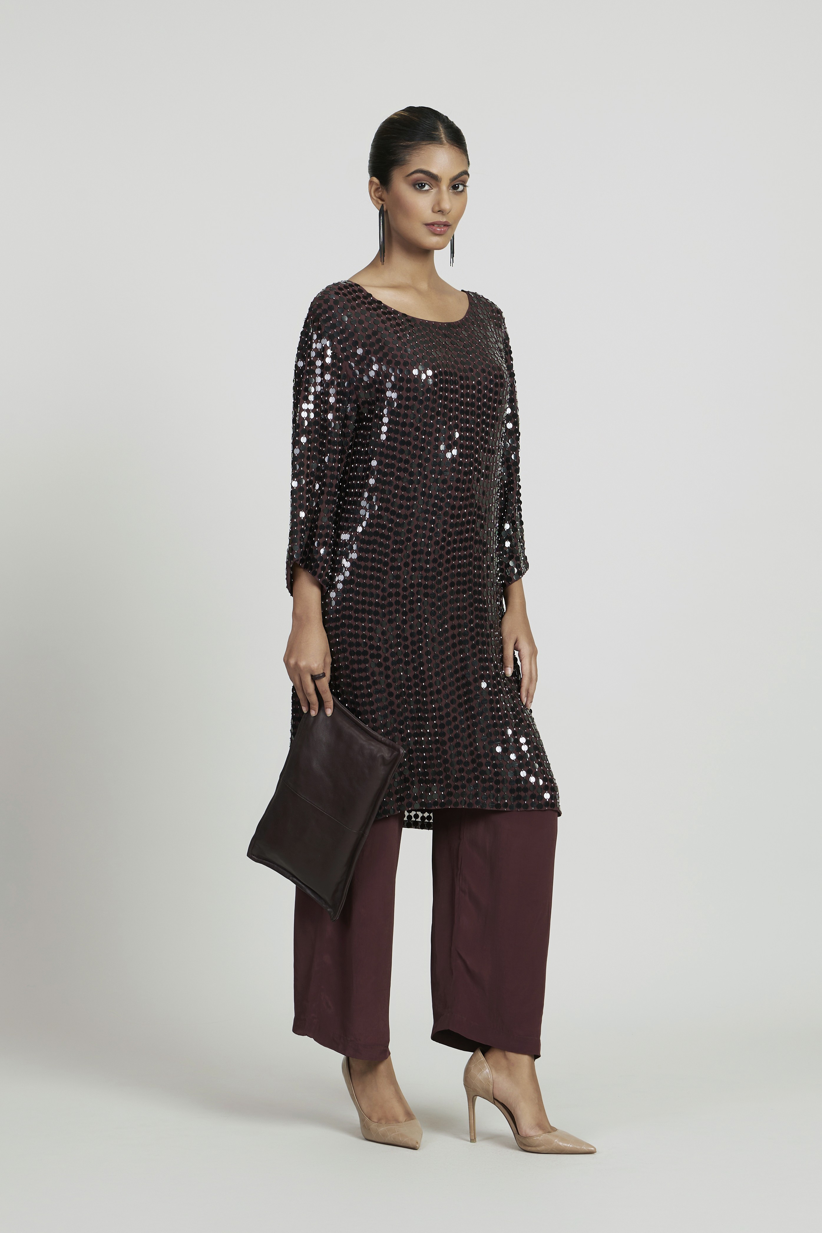 Friends laughing and posing inside a car