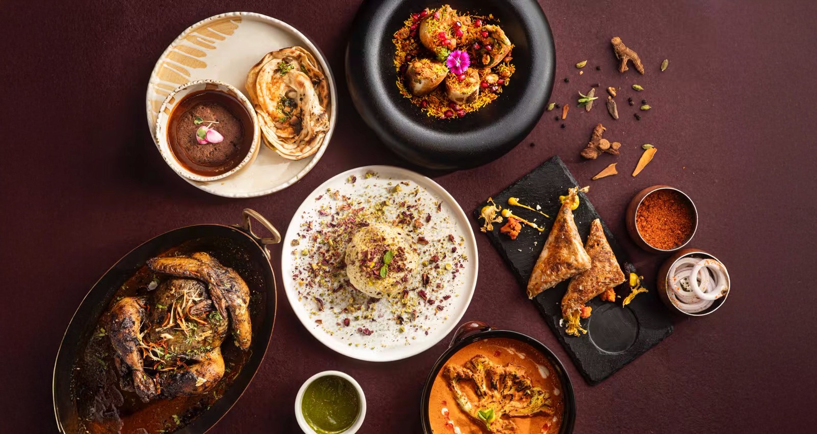 Batch.Works logo over a photo of a box of 3D printed objects