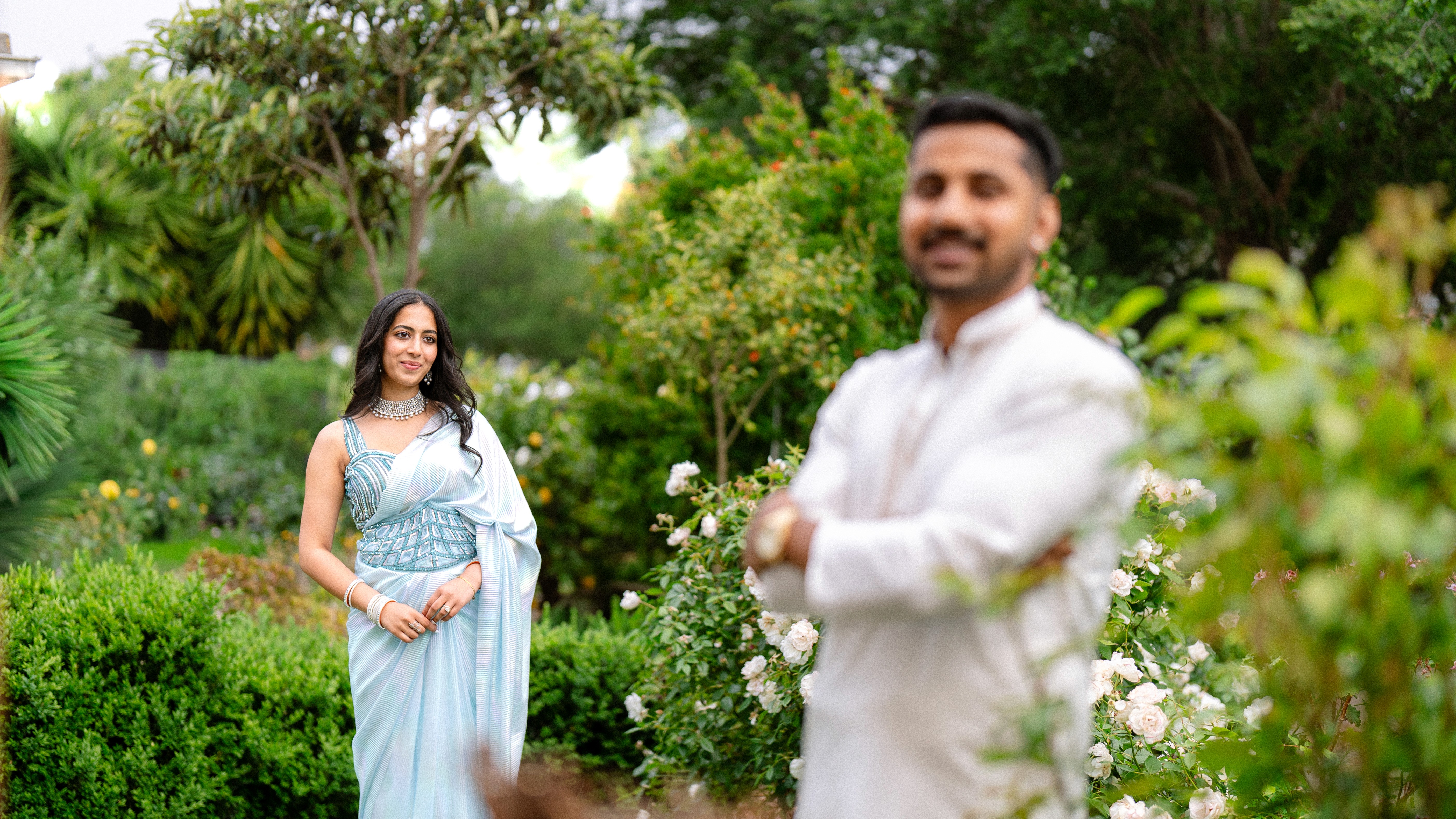 Warm string lights glow against a twilight sky.