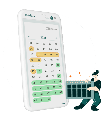 man opening his arms wide open on snow covered cliff with view of mountains during daytime