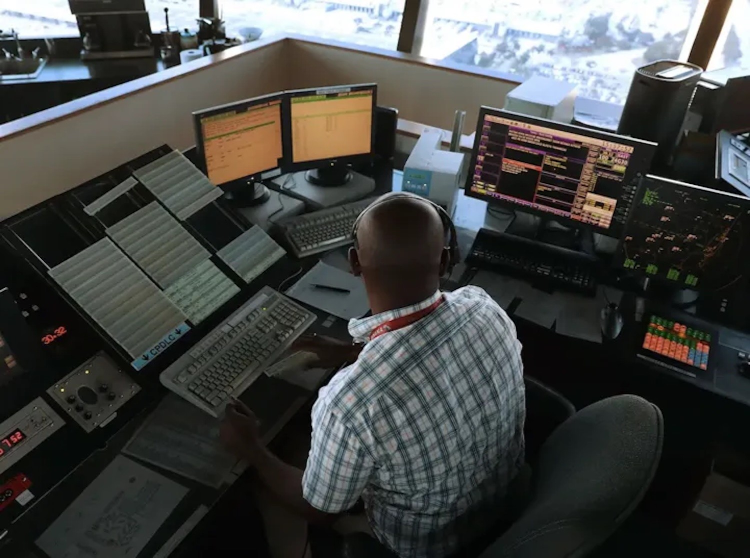 A myriad of antiquated interfaces, tools, and analog systems are used to coordinate flight operations. Courtesy of Joe Raedle/Getty Images