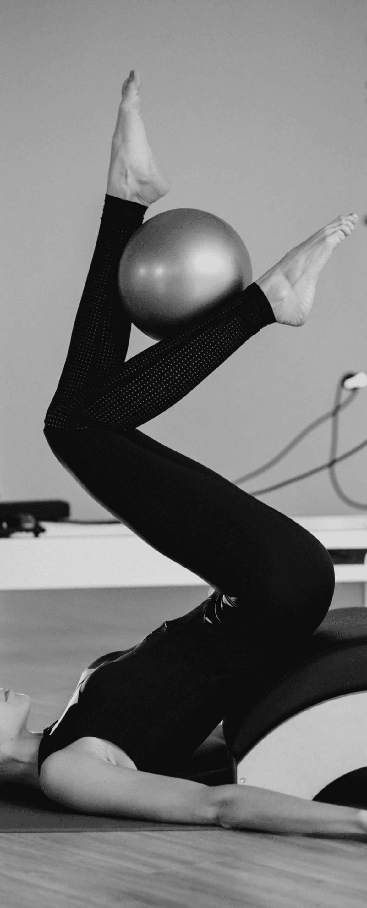 Woman practicing pilates