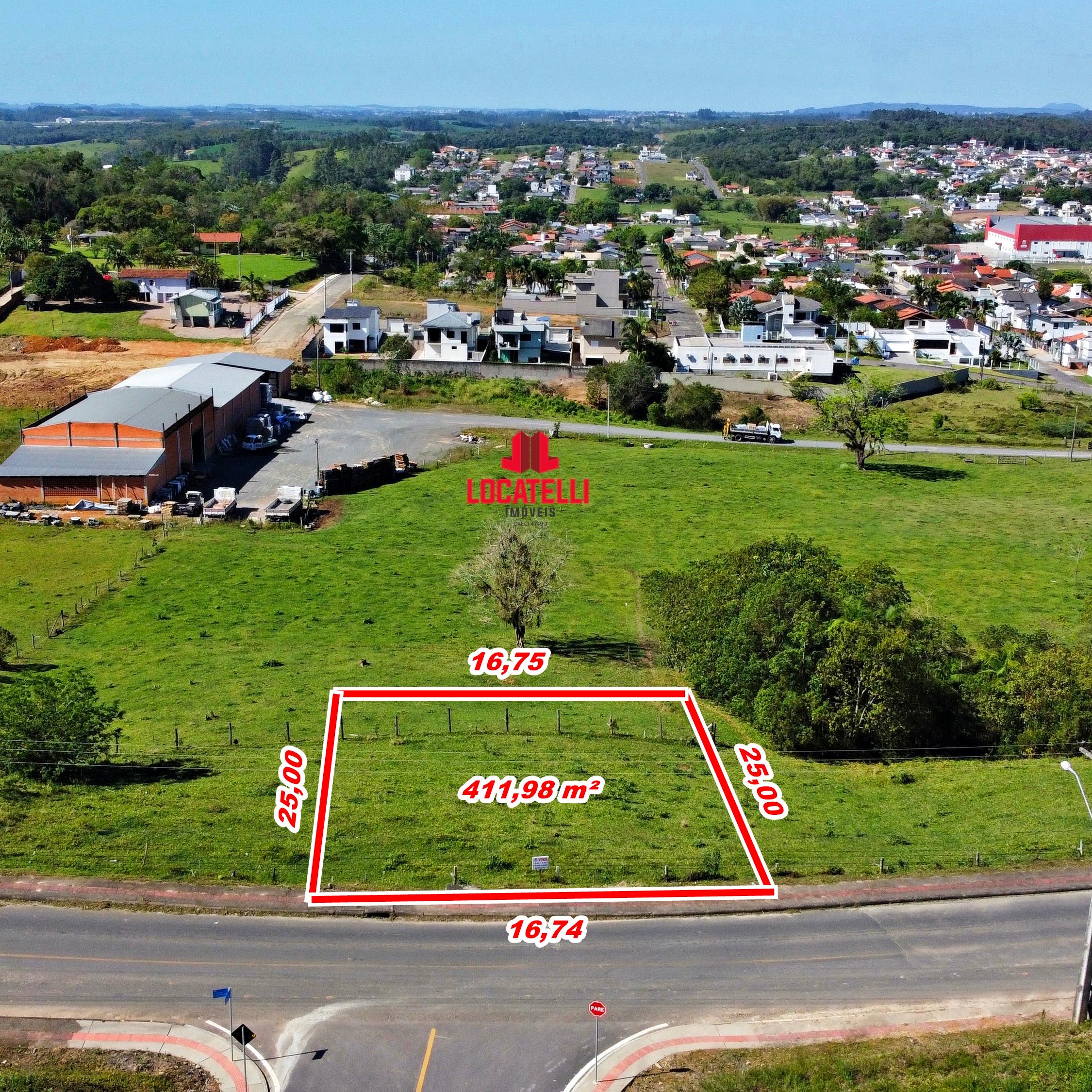 A modern brick house with a two-car garage, well-manicured lawn, and clear blue sky in the background.