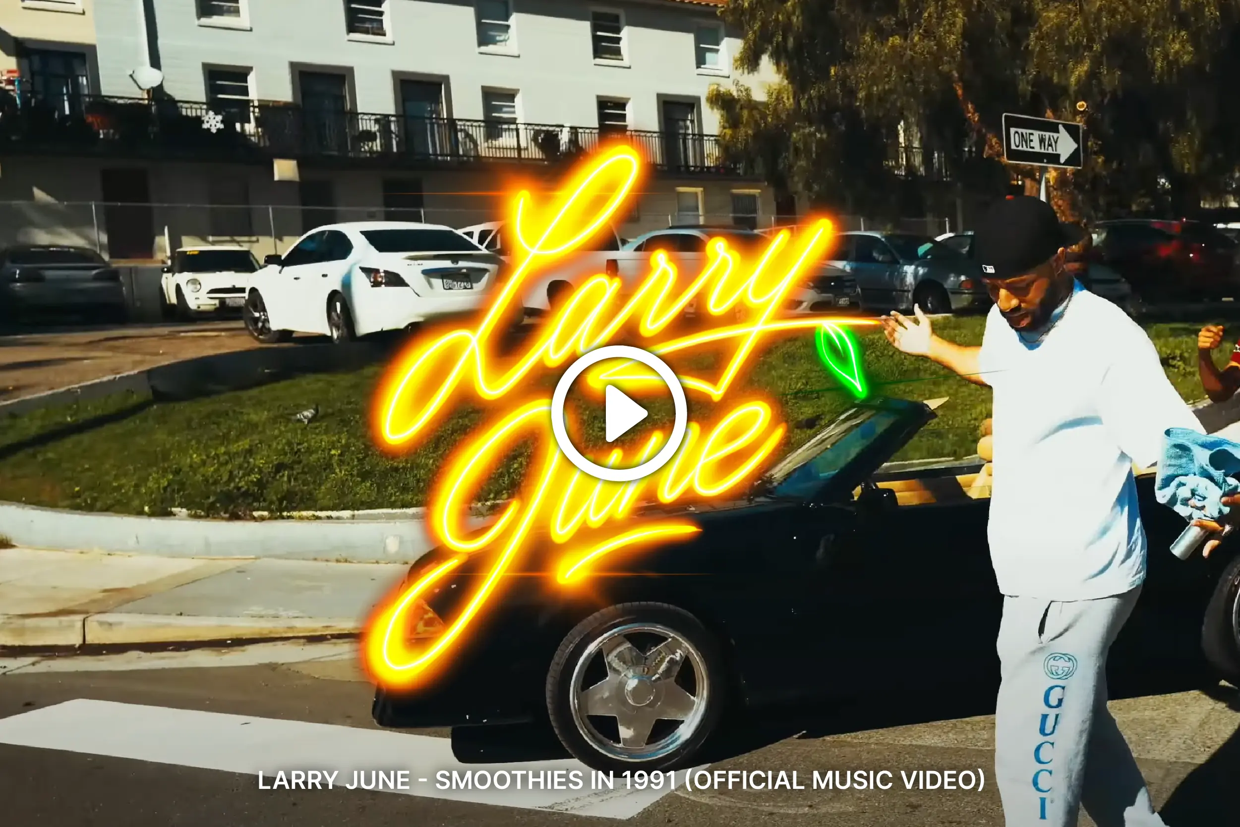 Music video still from “Smoothies in 1991” by Larry June linking to official YouTube video.