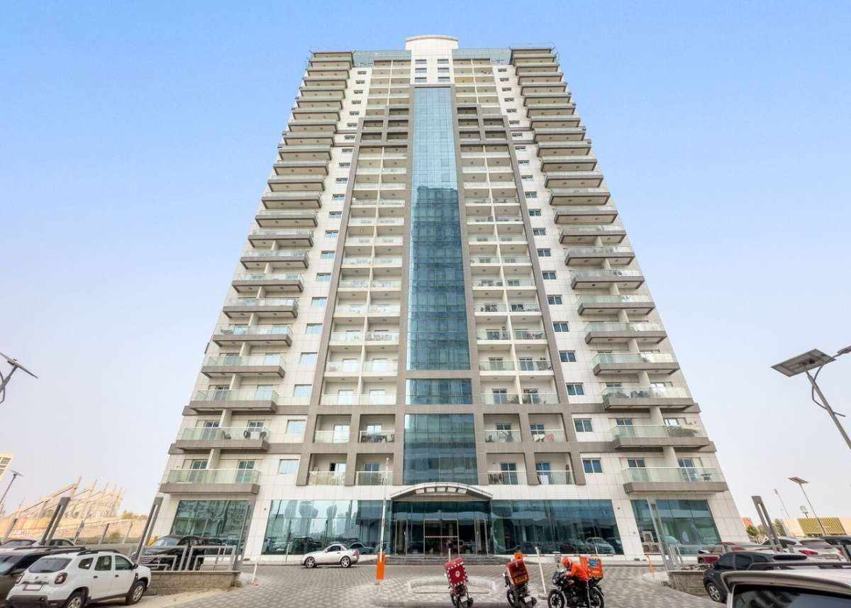 Exterior of Red Residence skyscraper, modern real estate for sale or rent by professional agents.