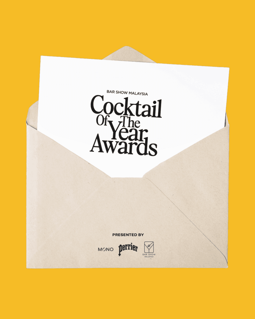 An envelope partially opened, revealing a card that reads 'BAR SHOW MALAYSIA Cocktail Of The Year Awards', set against a bright yellow background.