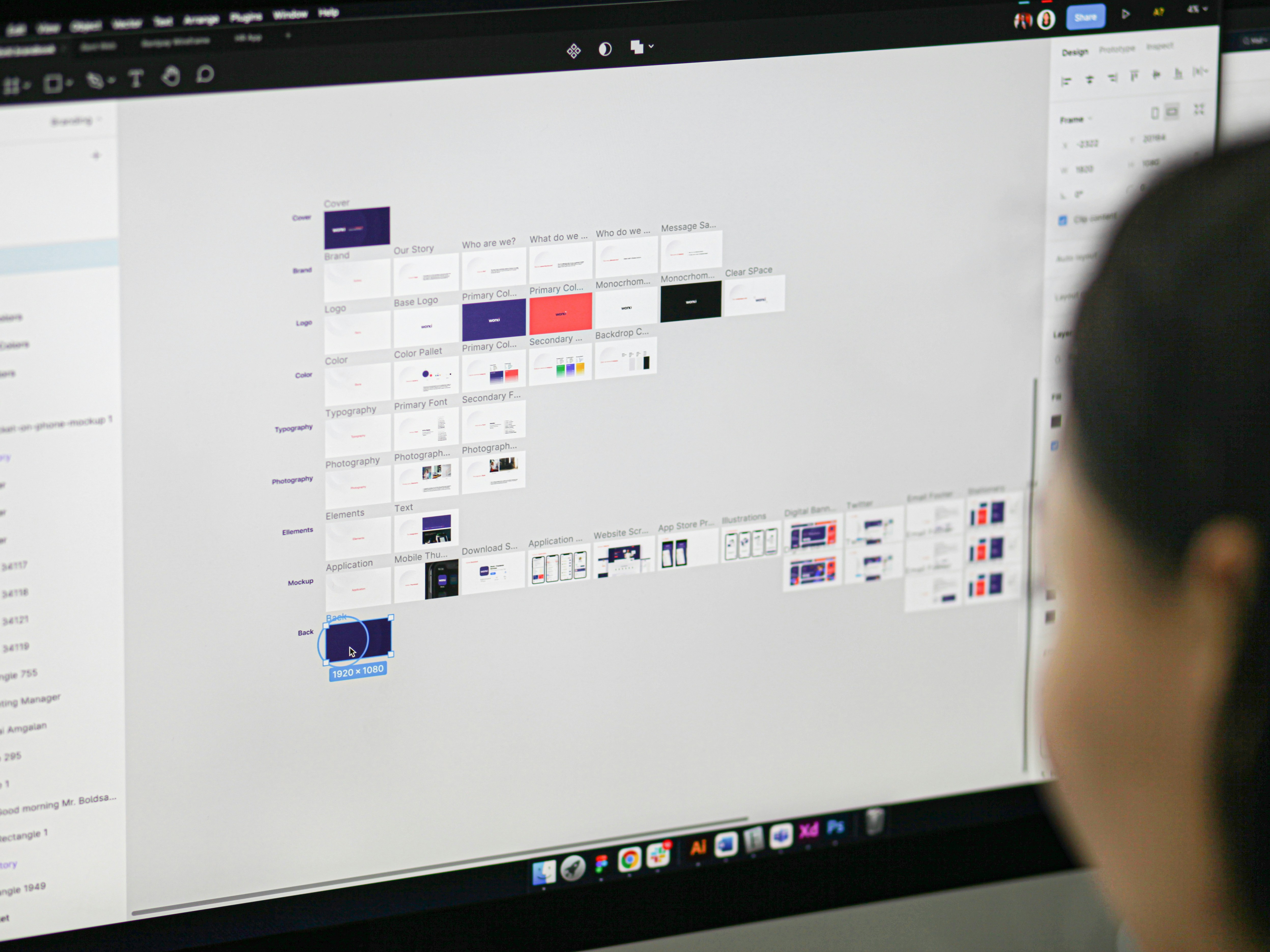 Designer learning Figma interface showcasing UI elements and branding components – a top resource for learning Figma in 2025.