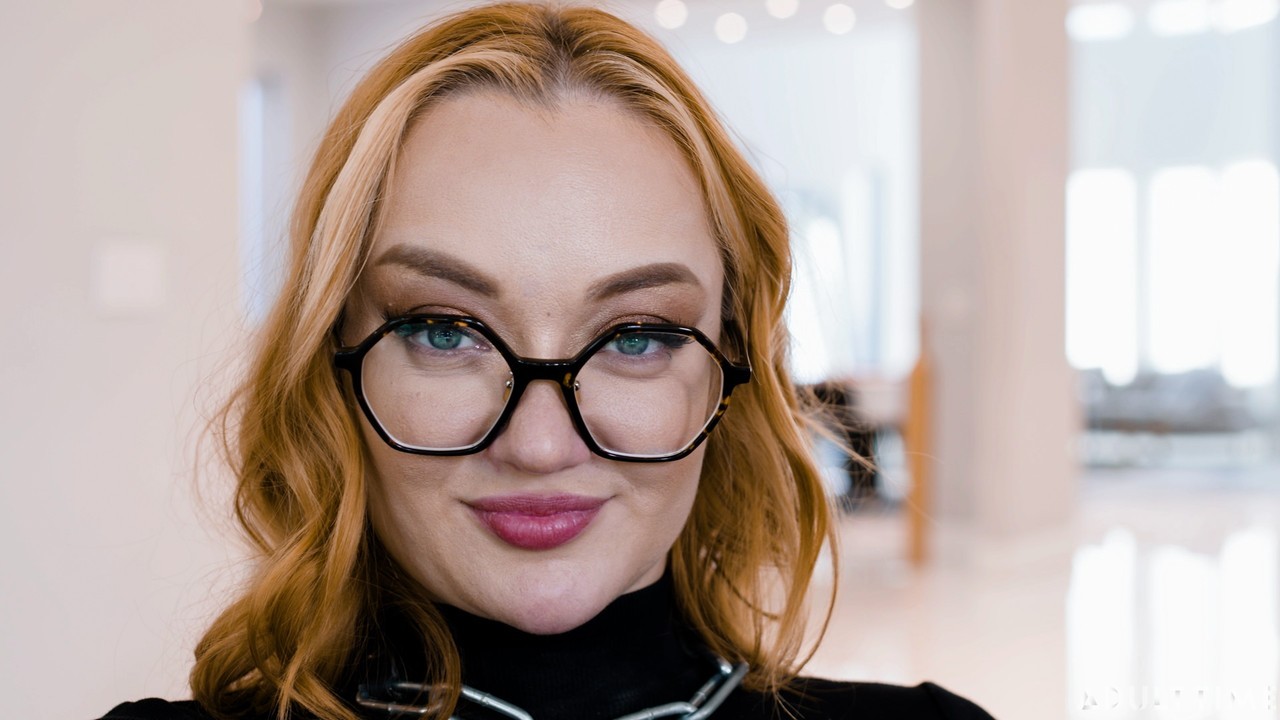 kids lying on a glass land and smiling