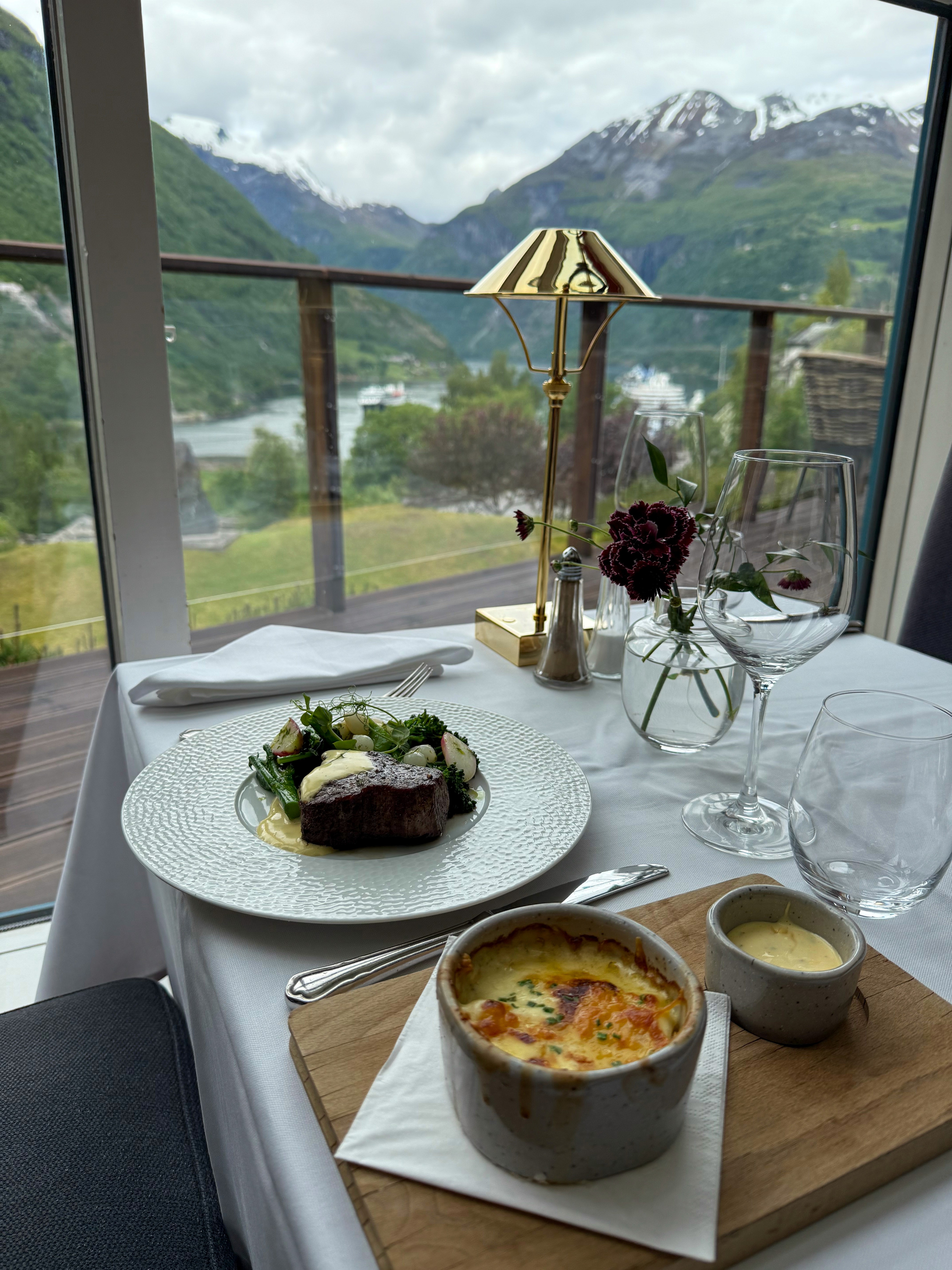 Shrimp boiling in a pot of water with bubbles, captured in a black and white photo, showcasing seafood cooking method.