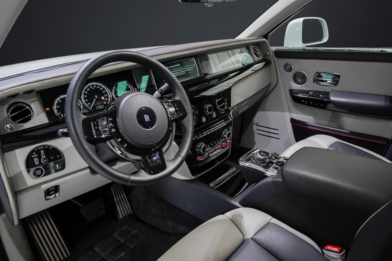 Front seats interior of Rolls-Royce Phantom Series II 2024, luxury leather cabin with premium craftsmanship and advanced comfort