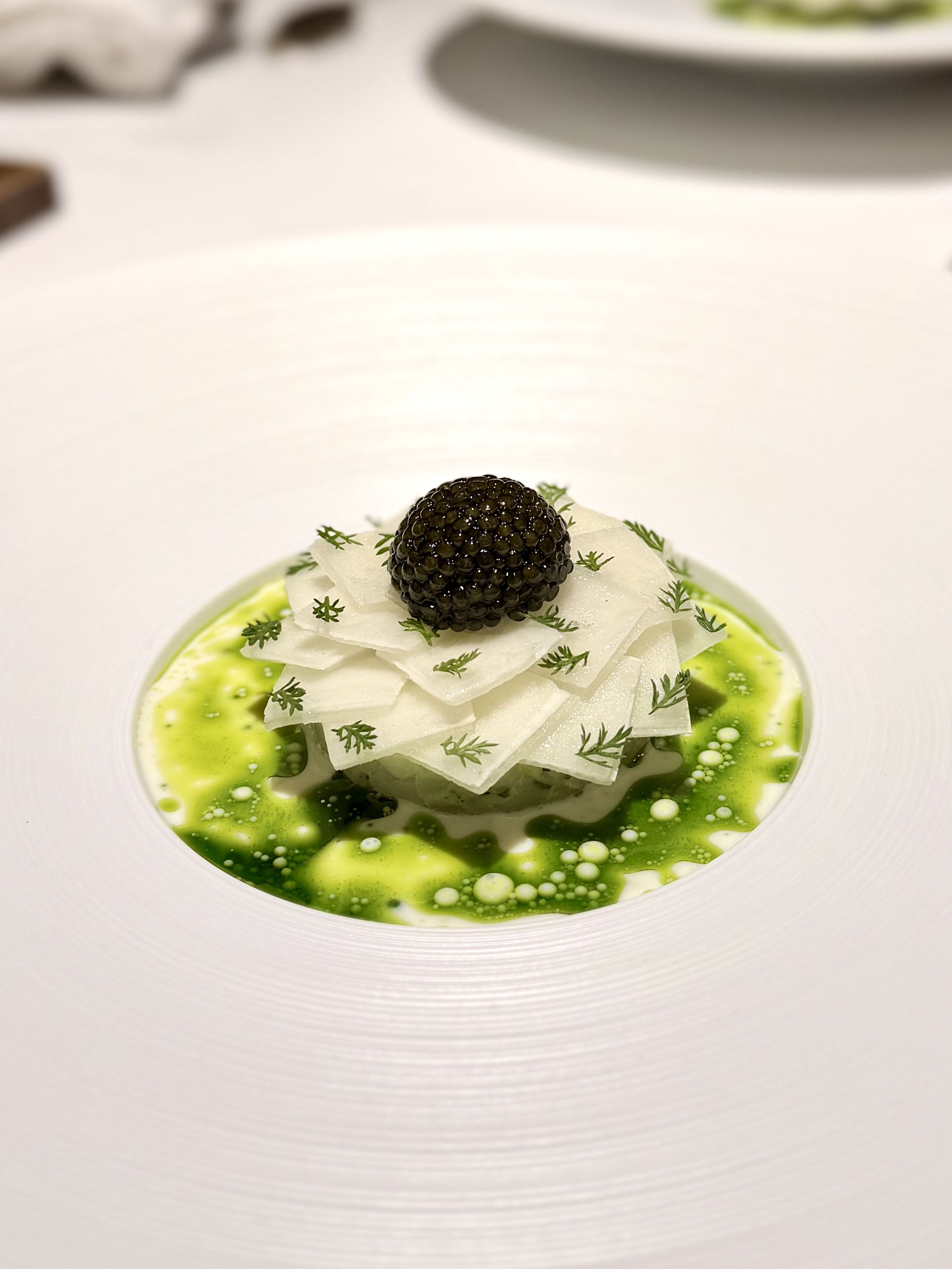 A fine-dining dish finished with caviar