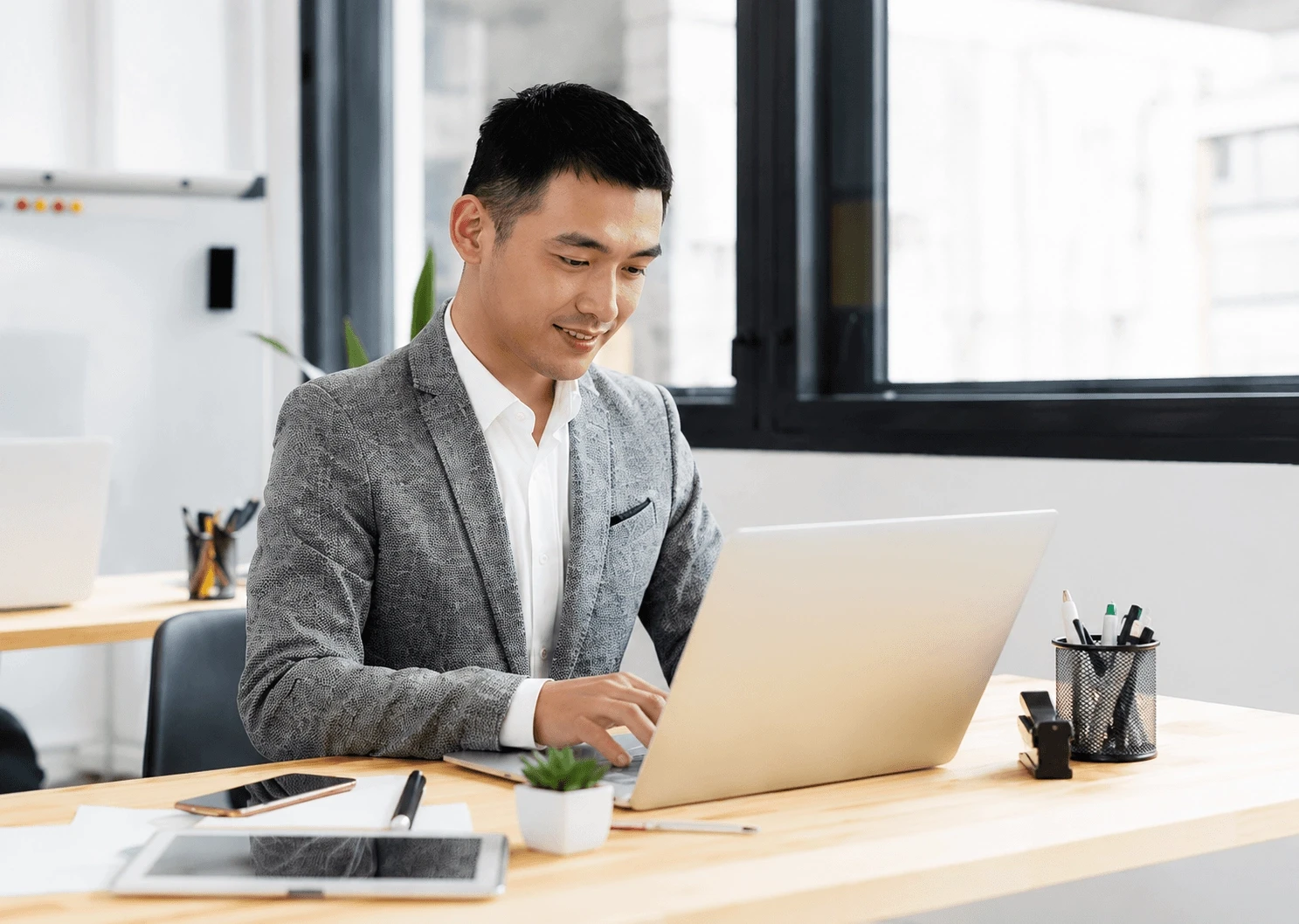 Legal professional reviewing financial reports and payment workflows using automated finance software.