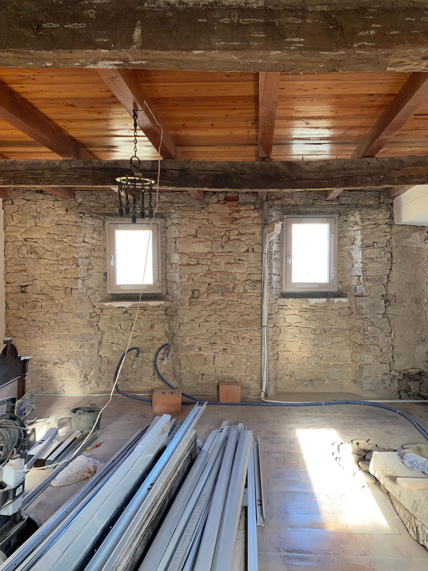 Upper room with timber ceiling during the works