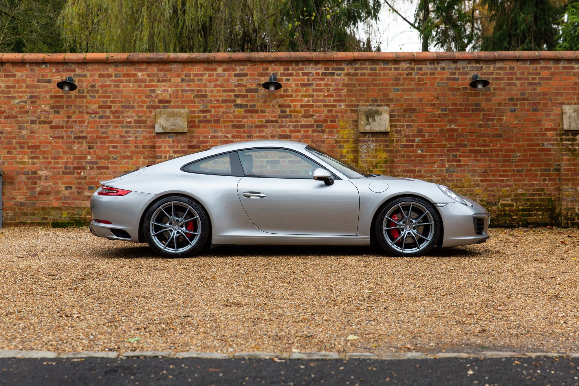 silver porsche right side