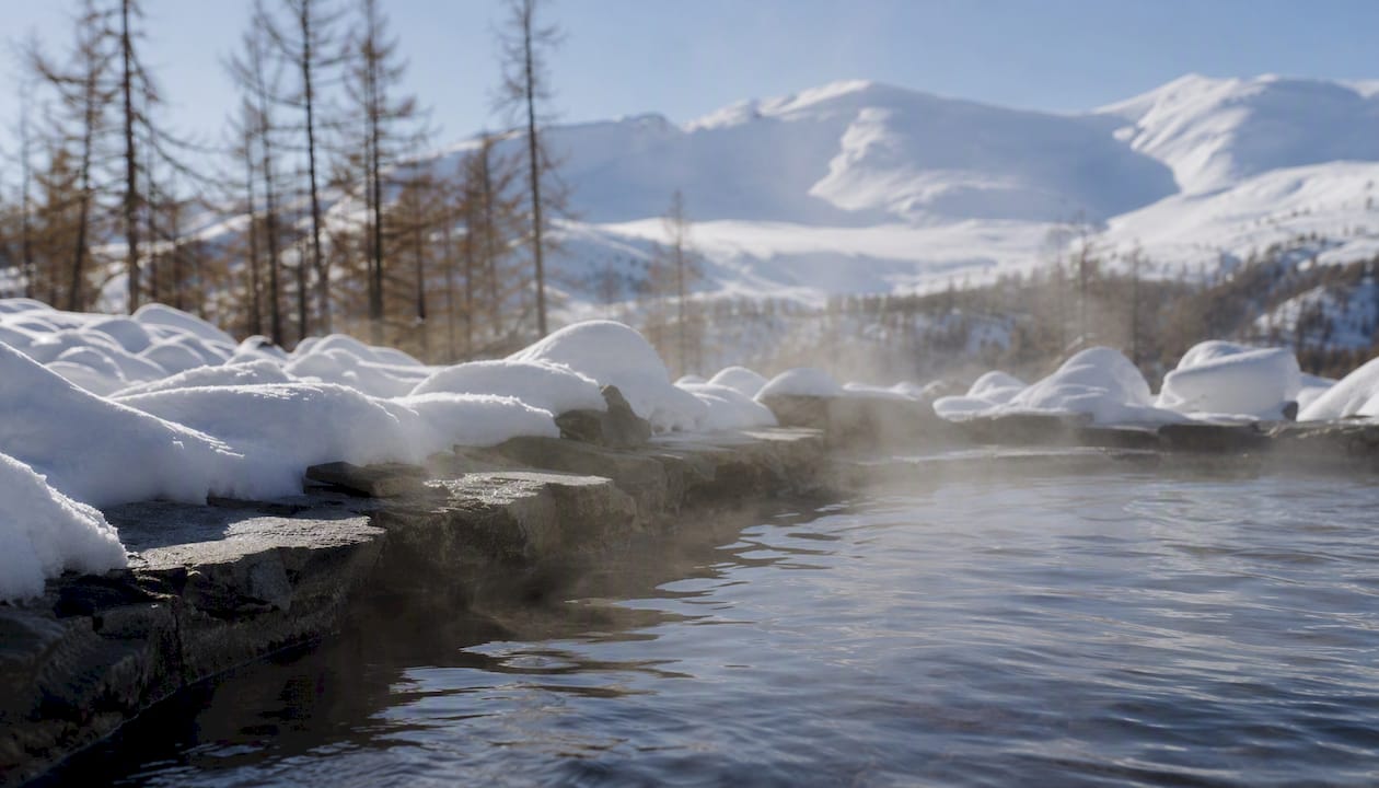 Outdoor cold-water plunge beside snow