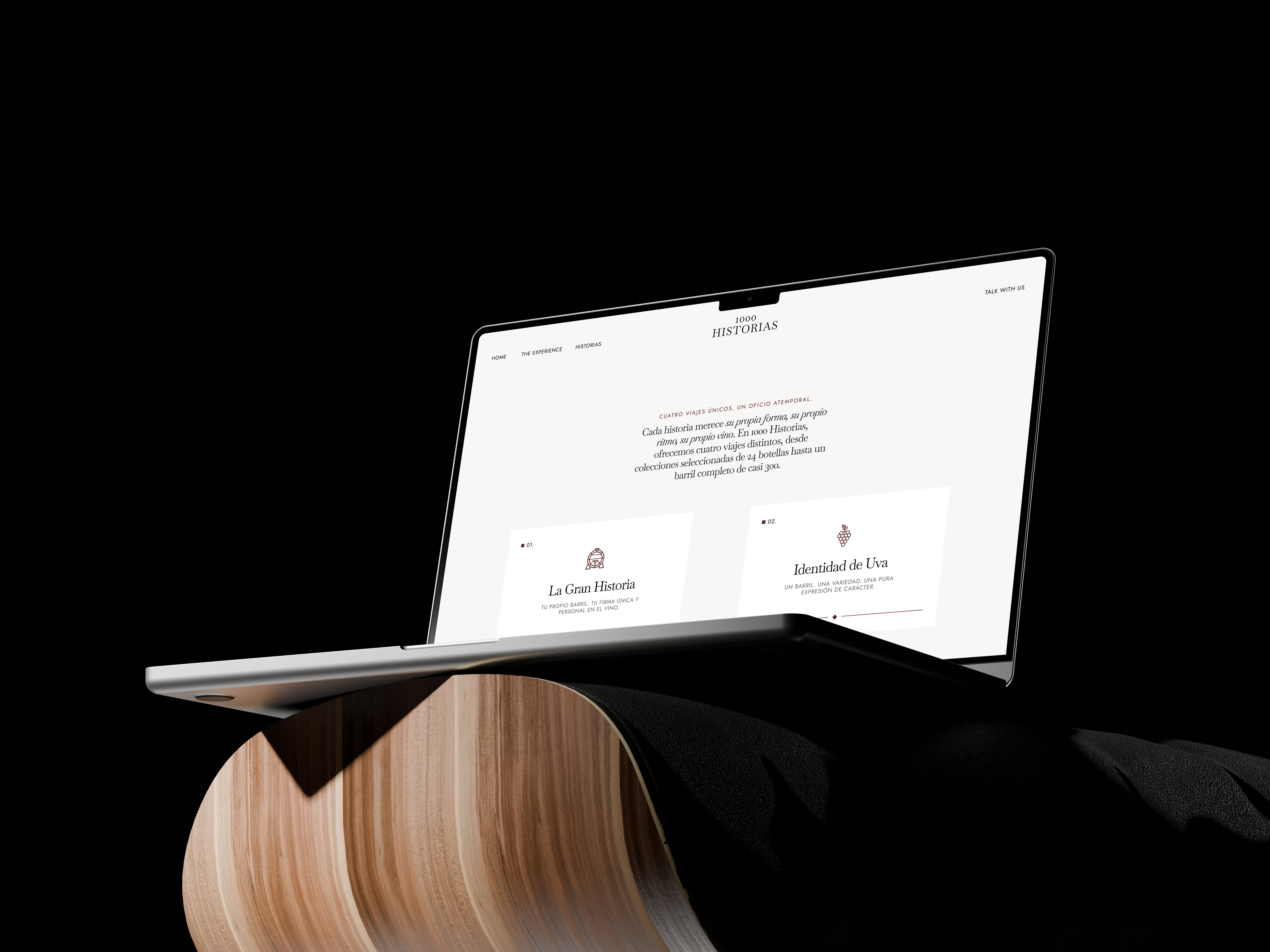 1000 Historias website displayed on a macbook