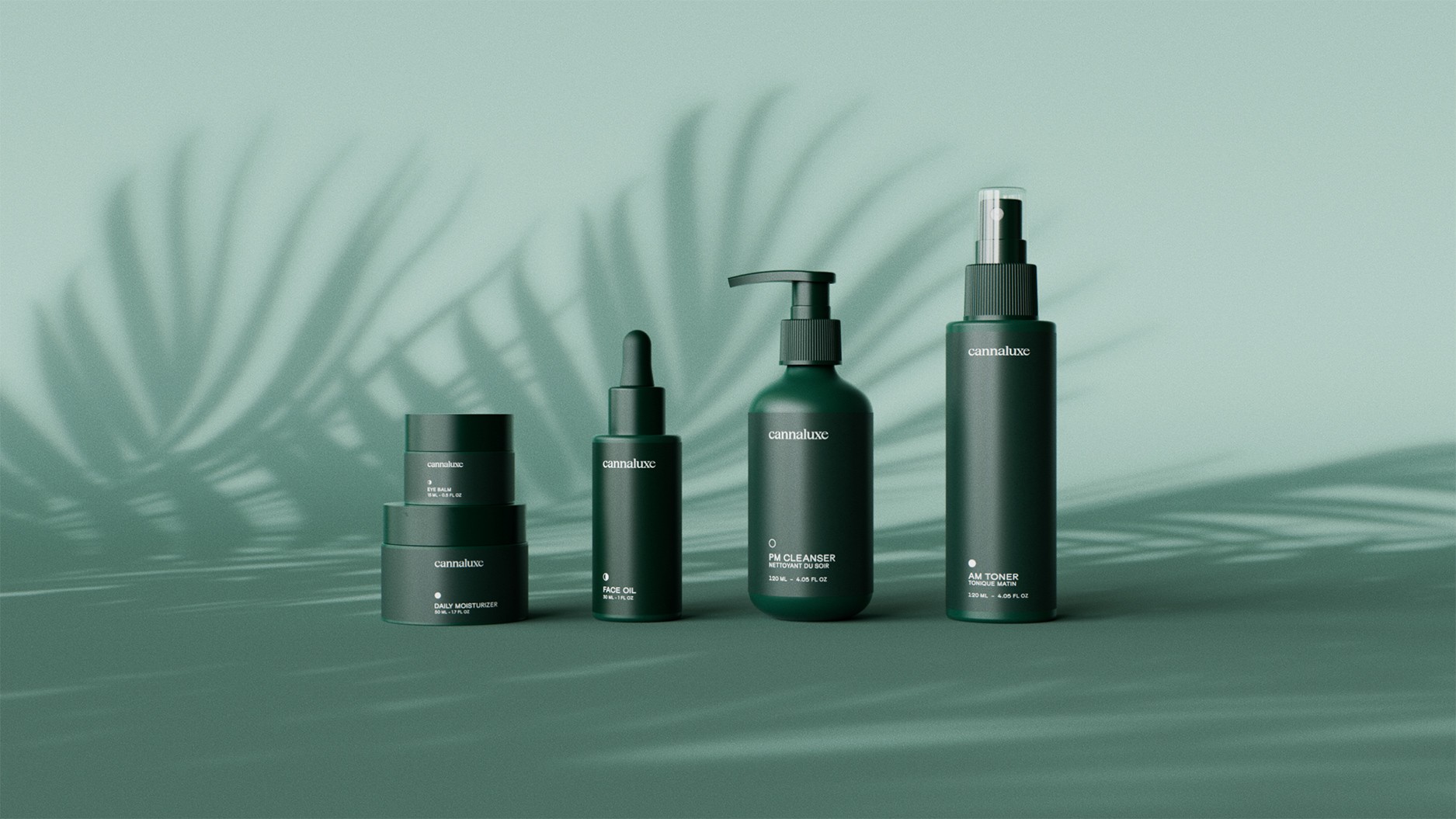 Cannaluxe skincare products displayed outdoors with shadowed palm leaves in the background
