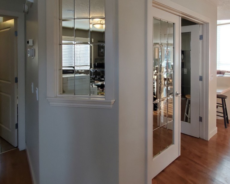 An interior room with windows and a 45 degree angle. It is awkward and feels like wasted space.