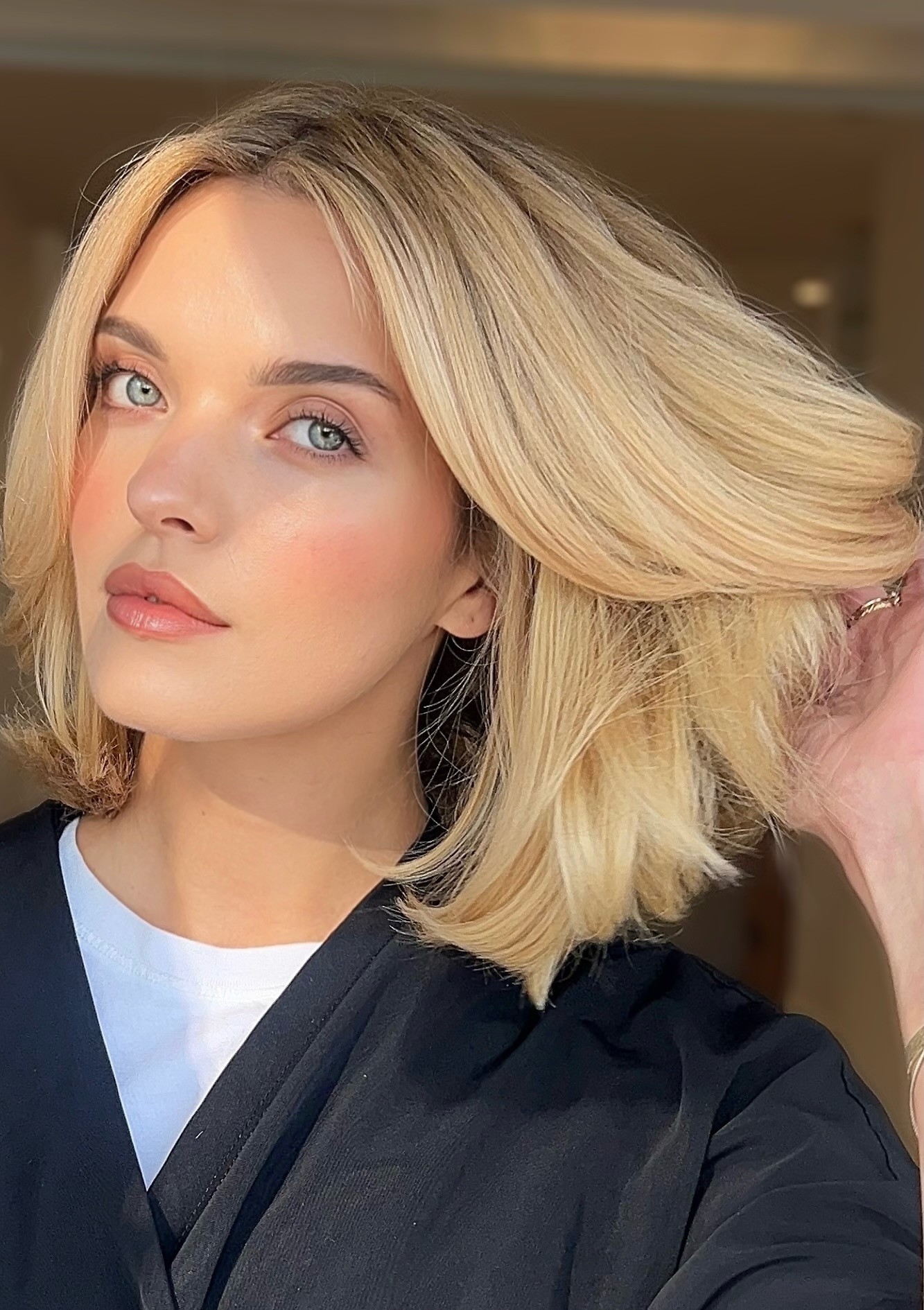 Soft dimensional blonde hair with natural highlights at Bomane Salon, Beverly Hills – expertly blended by hair color specialists.